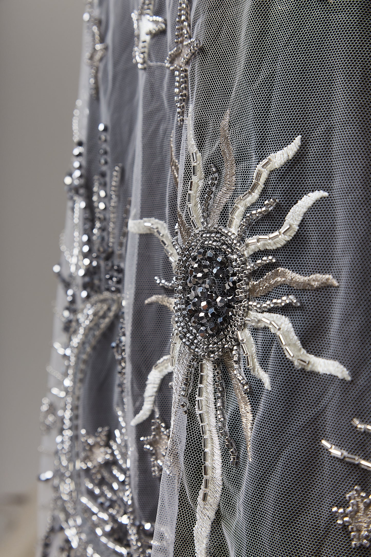 S0635 EMBROIDERED TULLE WITH SEQUINS AND BEADS IN PELTRE, SILVER AND OFF WHITE