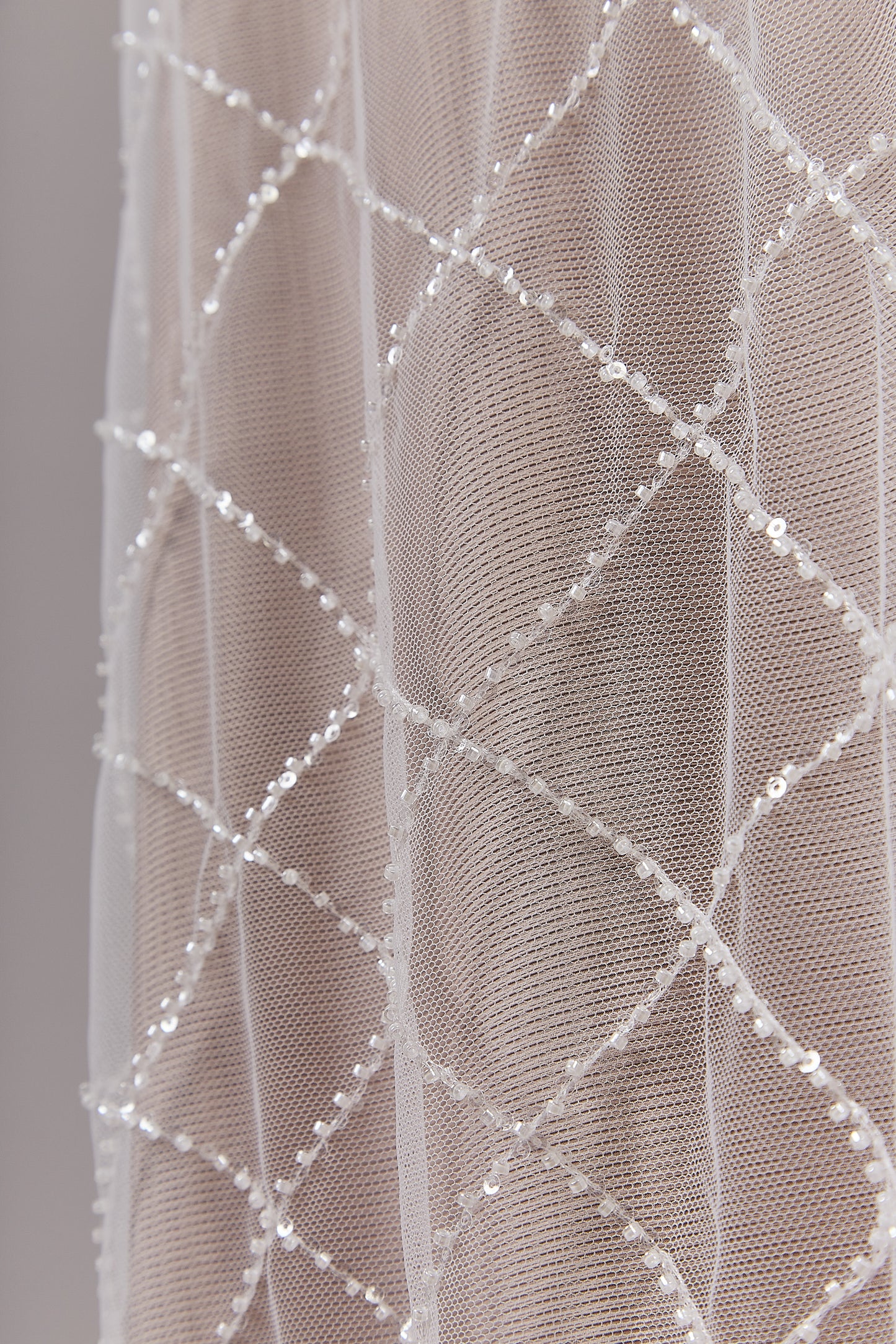 S0645 OFF WHITE BEADED TULLE