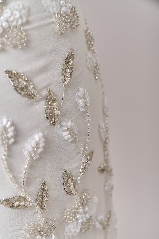 S0710 - Chiffon embroidered with silver metallic thread, silver beads, off-white pearls, long off-white bugle beads, and off-white sequins