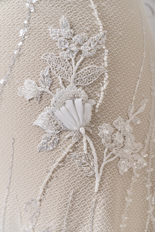 684 - Embroidered netting with 3D chiffon flowers, off-white beads, transparent and silver sequins