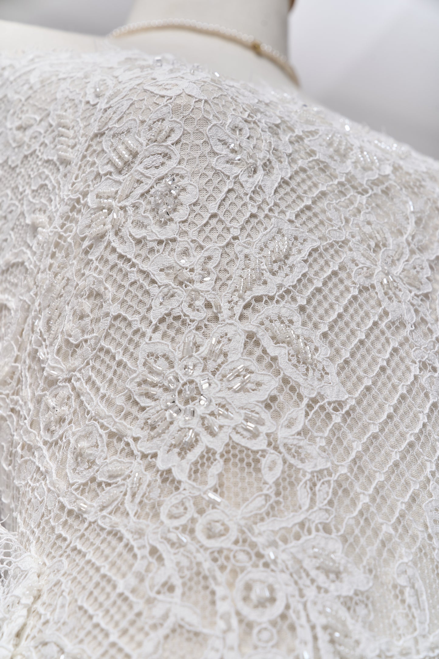 S0678 - Embroidered lace with off-white bugle, transparent rhinestones, and transparent sequins