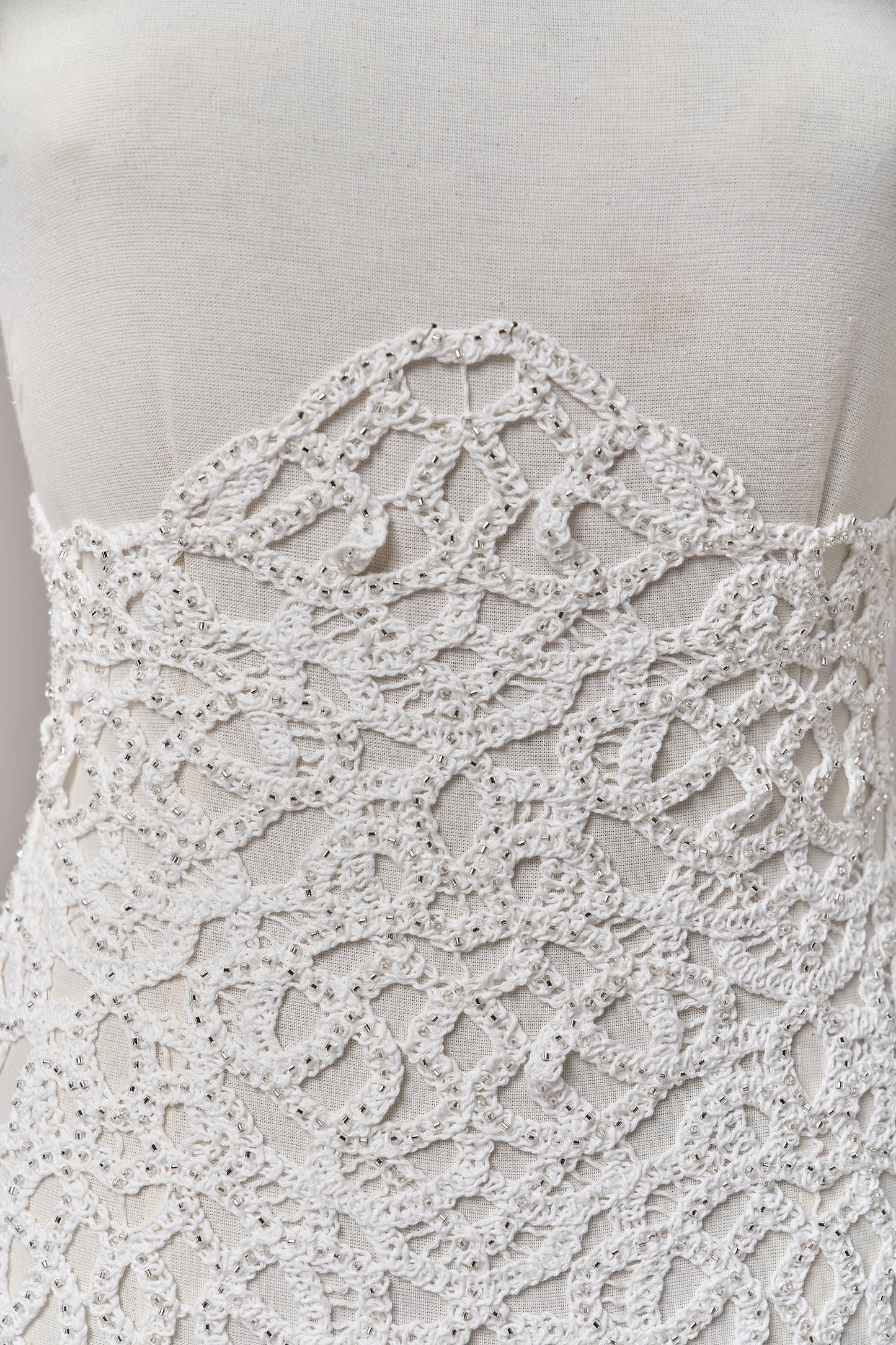 S0713 - Cotton guipure with fringe, embroidered with silver beads