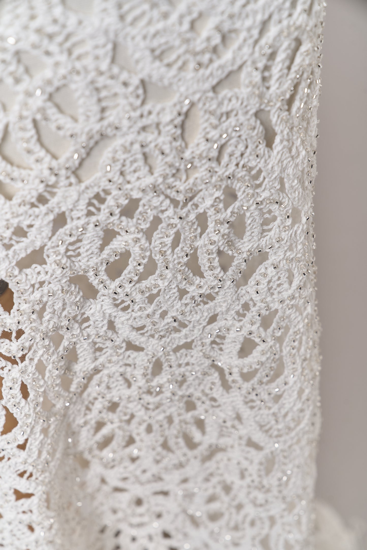 S0713 - Cotton guipure with fringe, embroidered with silver beads