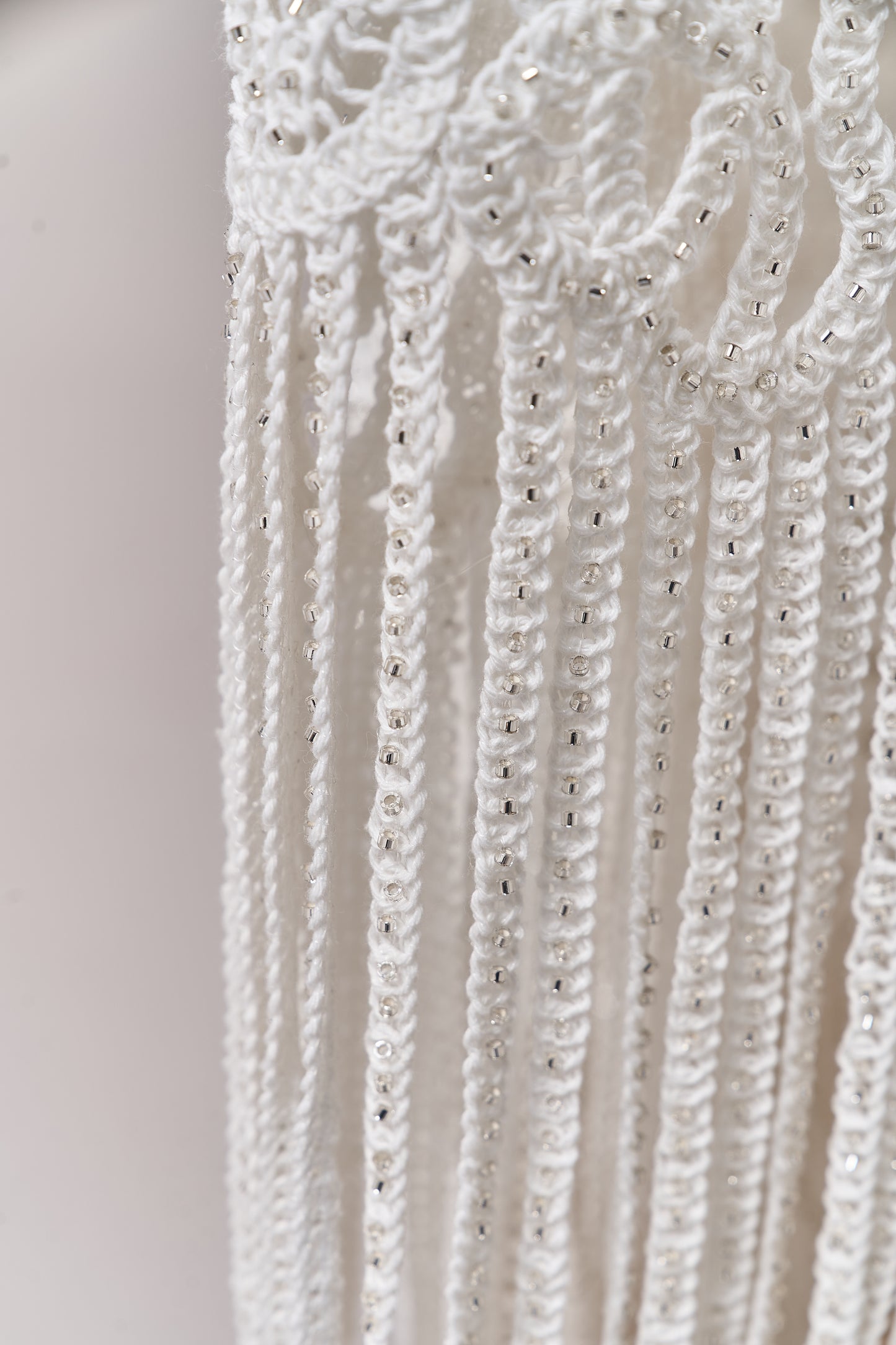 S0713 - Cotton guipure with fringe, embroidered with silver beads
