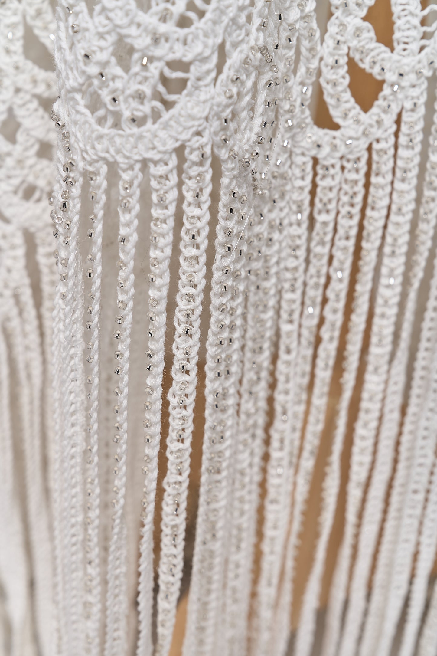 S0713 - Cotton guipure with fringe, embroidered with silver beads