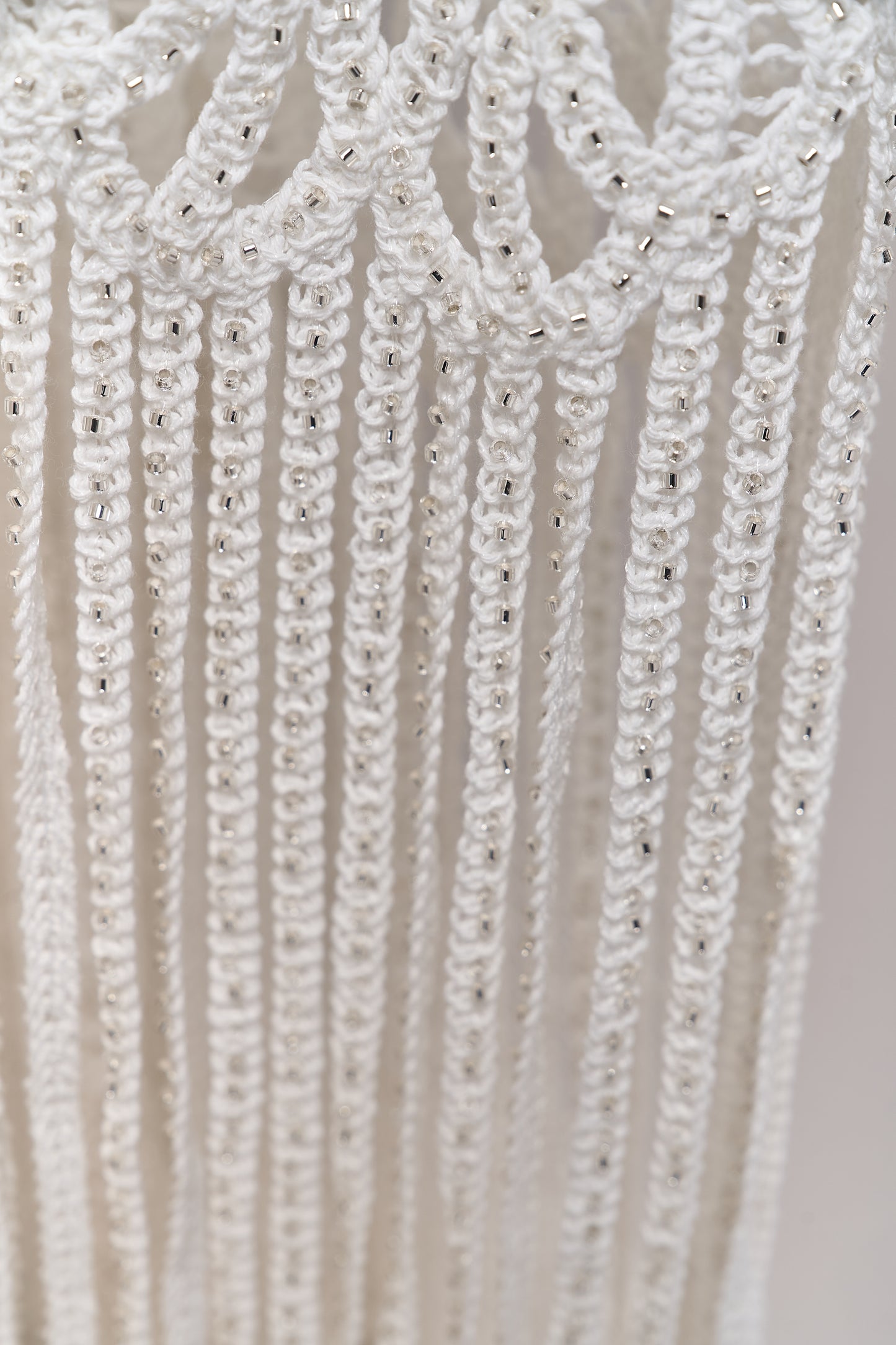 S0713 - Cotton guipure with fringe, embroidered with silver beads