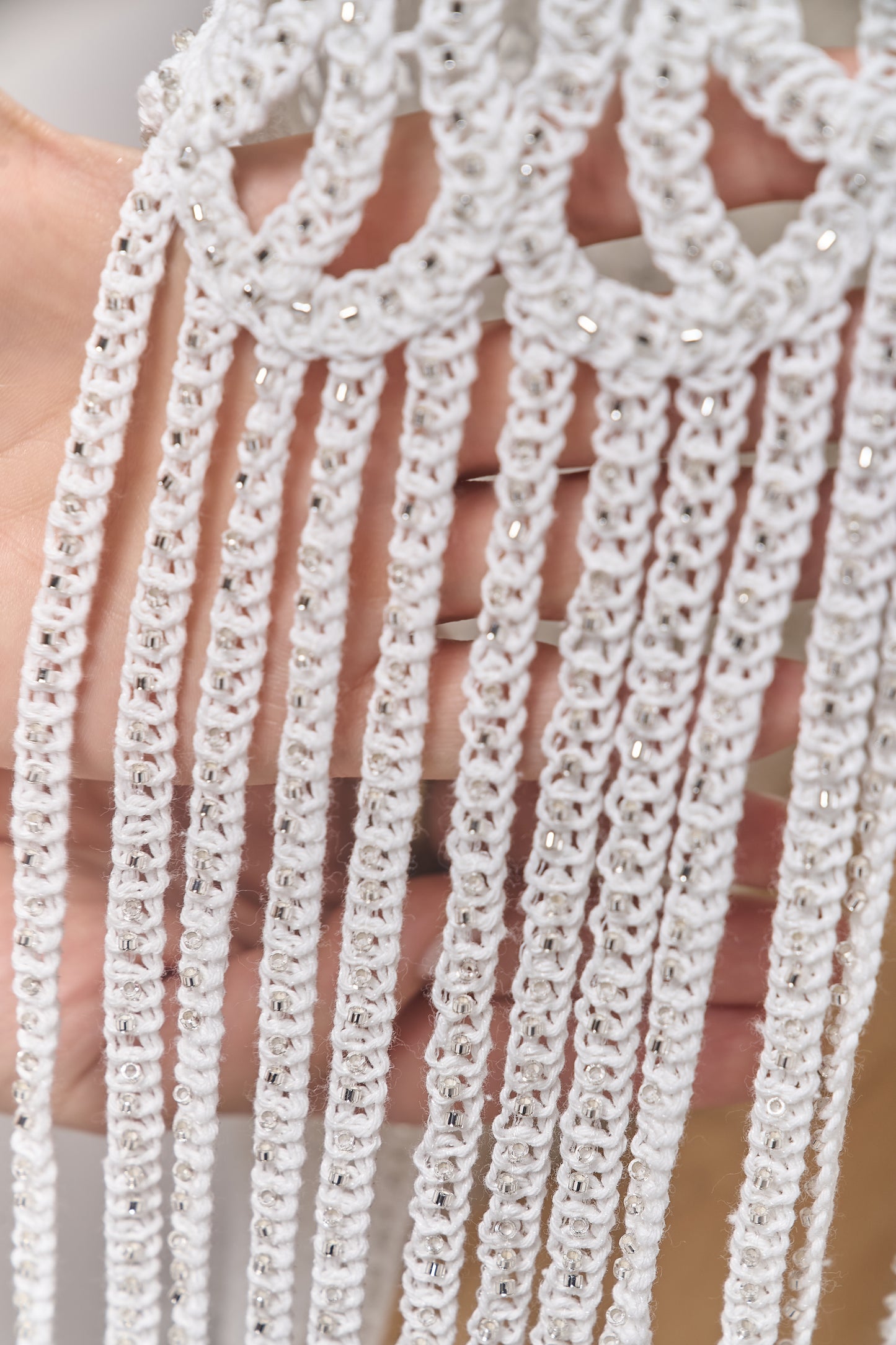 S0713 - Cotton guipure with fringe, embroidered with silver beads