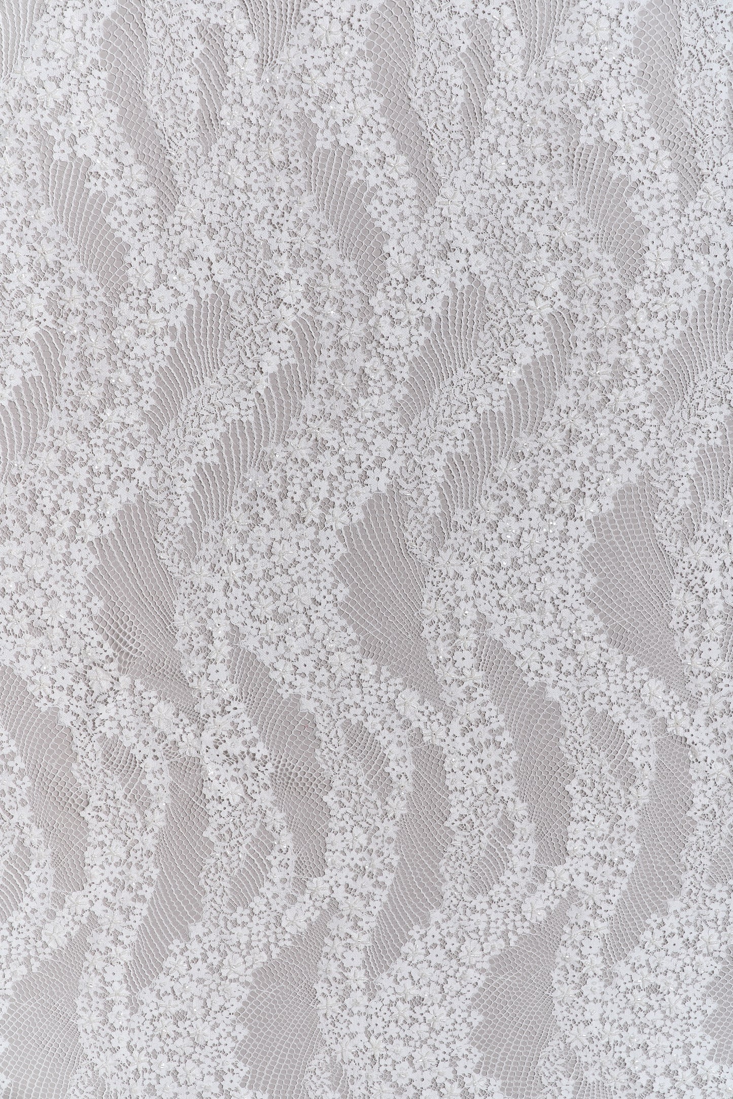 S0679 - Embroidered lace with off-white &nbsp;beads, long off-white bugle beads, and transparent sequins