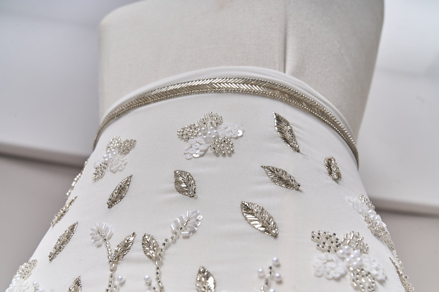 S0710 - Chiffon embroidered with silver metallic thread, silver beads, off-white pearls, long off-white bugle beads, and off-white sequins