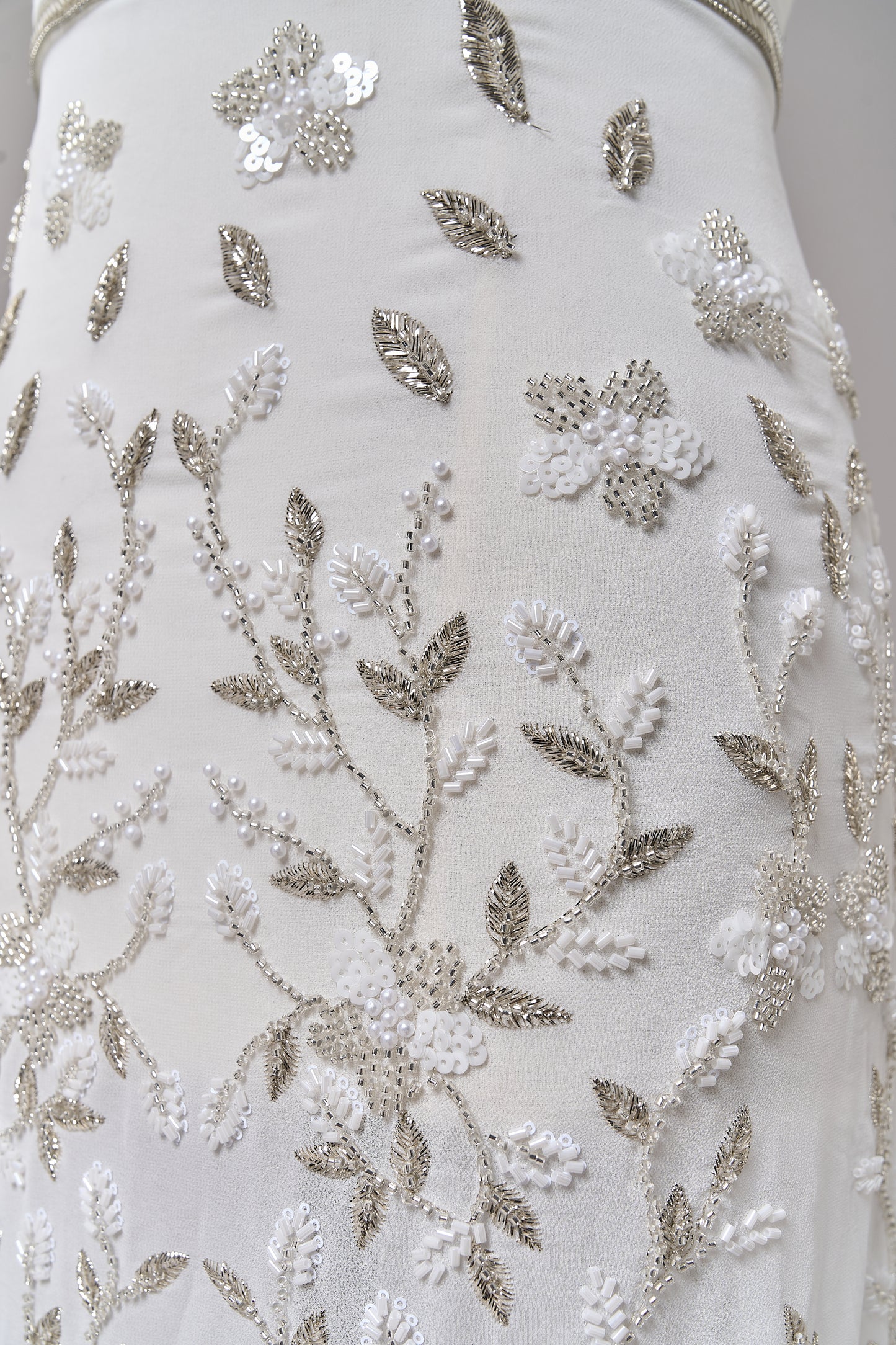 S0710 - Chiffon embroidered with silver metallic thread, silver beads, off-white pearls, long off-white bugle beads, and off-white sequins
