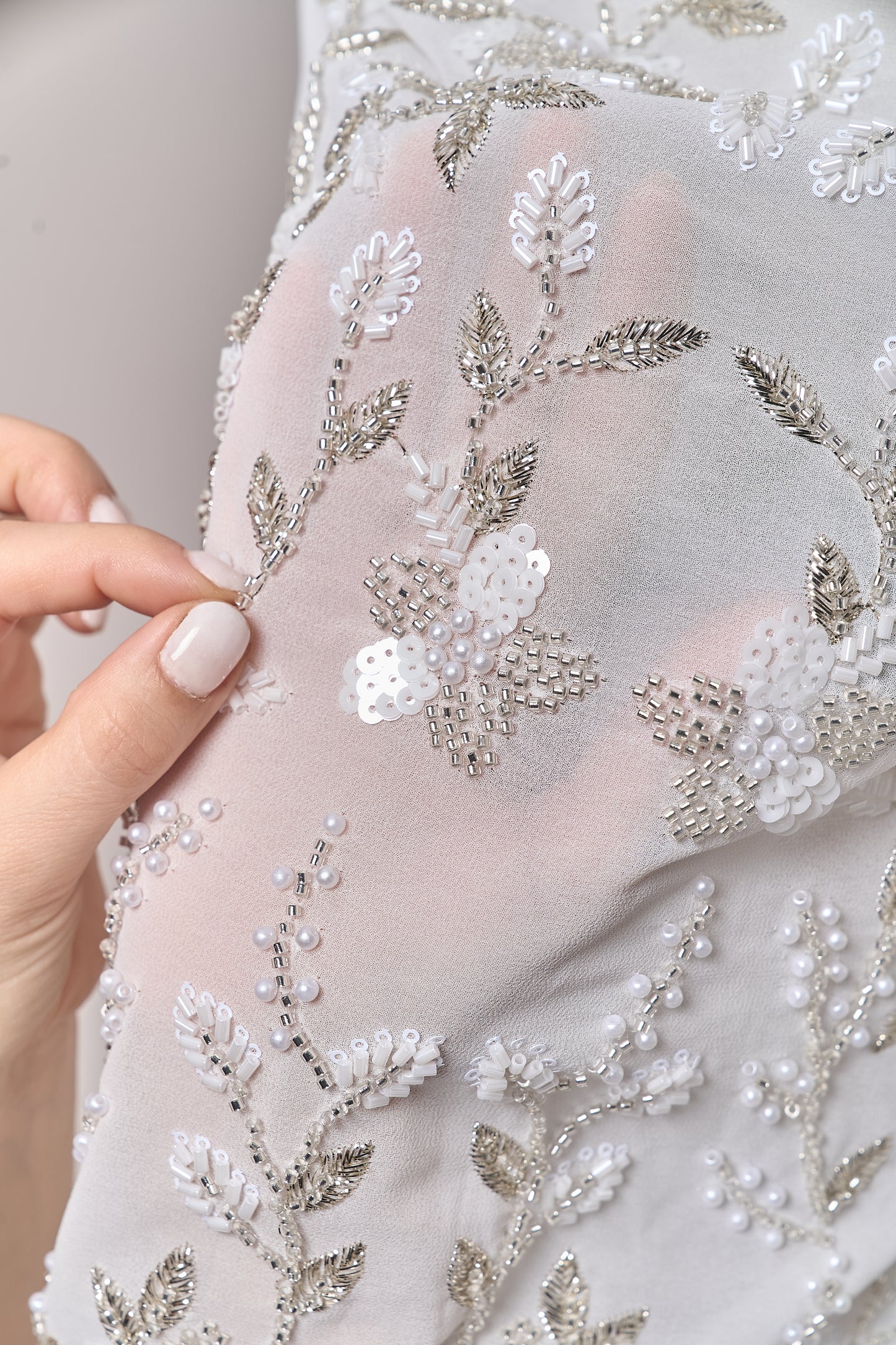 S0710 - Chiffon embroidered with silver metallic thread, silver beads, off-white pearls, long off-white bugle beads, and off-white sequins