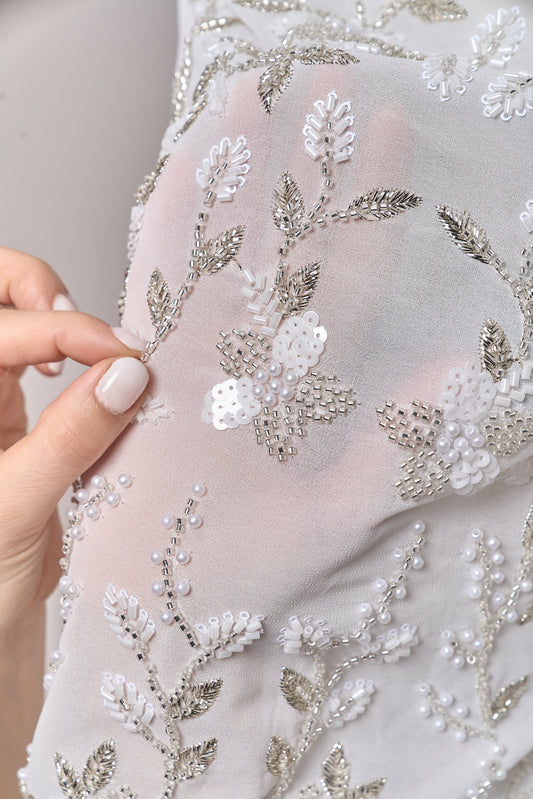 S0710 - Chiffon embroidered with silver metallic thread, silver beads, off-white pearls, long off-white bugle beads, and off-white sequins