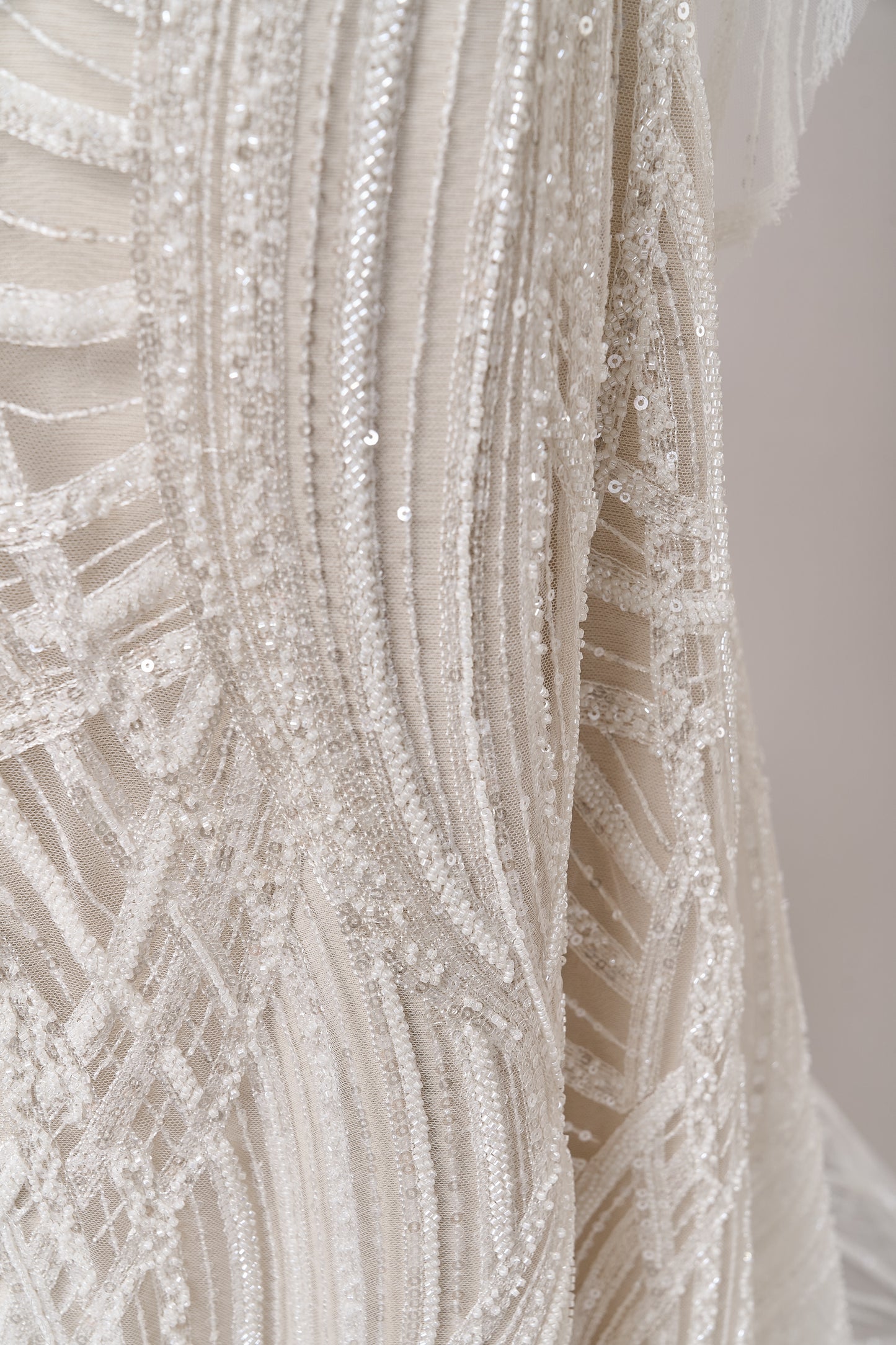 S0693 - Embroidered tulle with off-white beads and transparent sequins