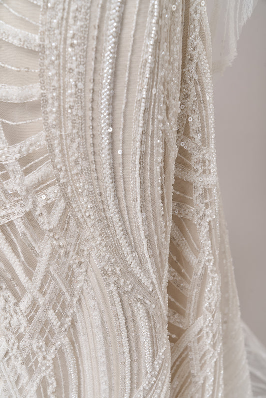 S0693 - Embroidered tulle with off-white beads and transparent sequins