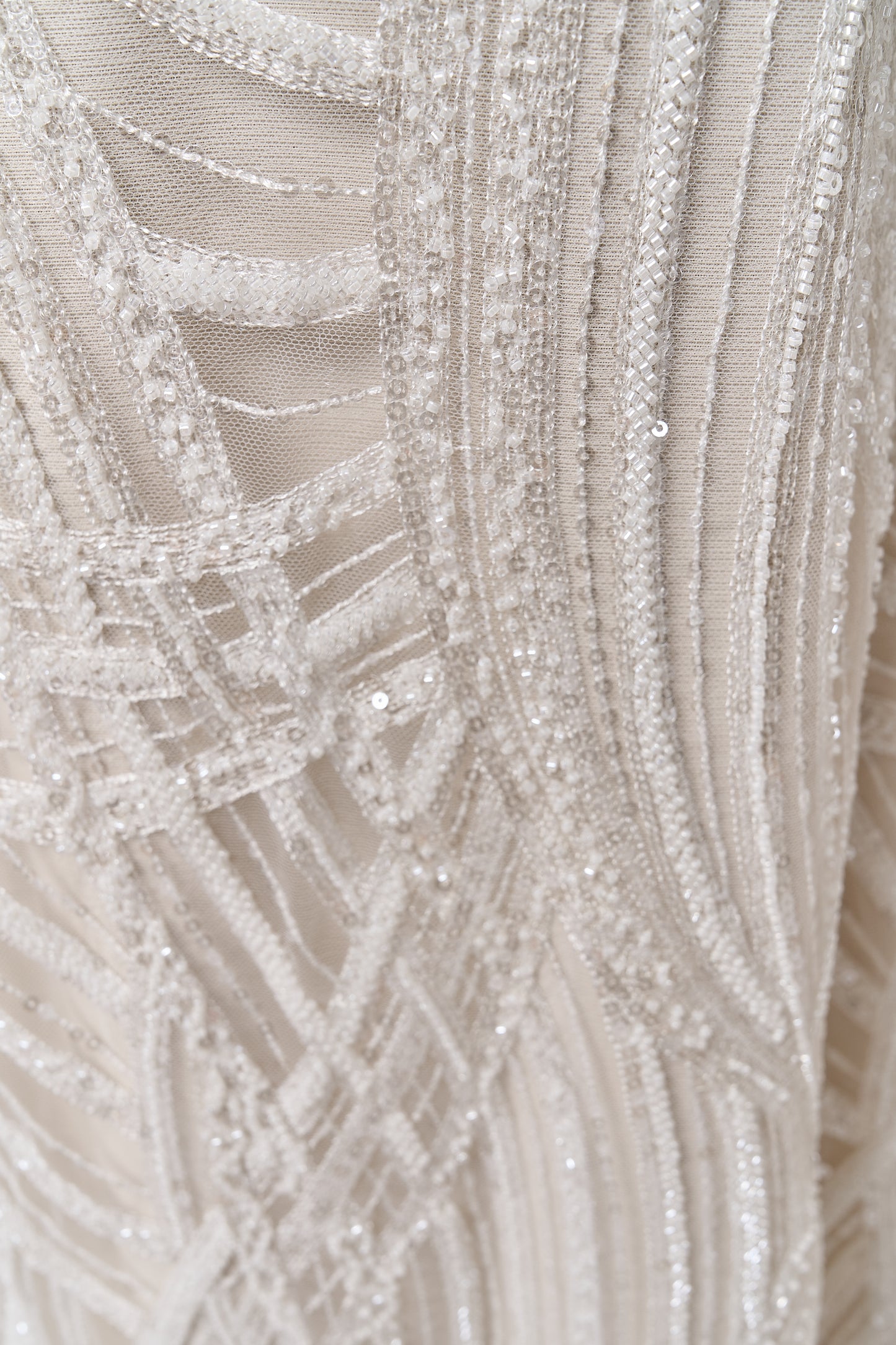 S0693 - Embroidered tulle with off-white beads and transparent sequins