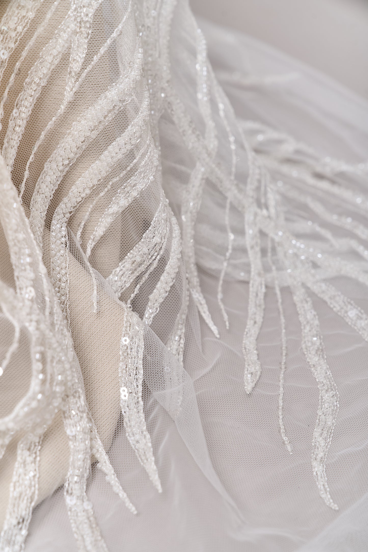 S0693 - Embroidered tulle with off-white beads and transparent sequins