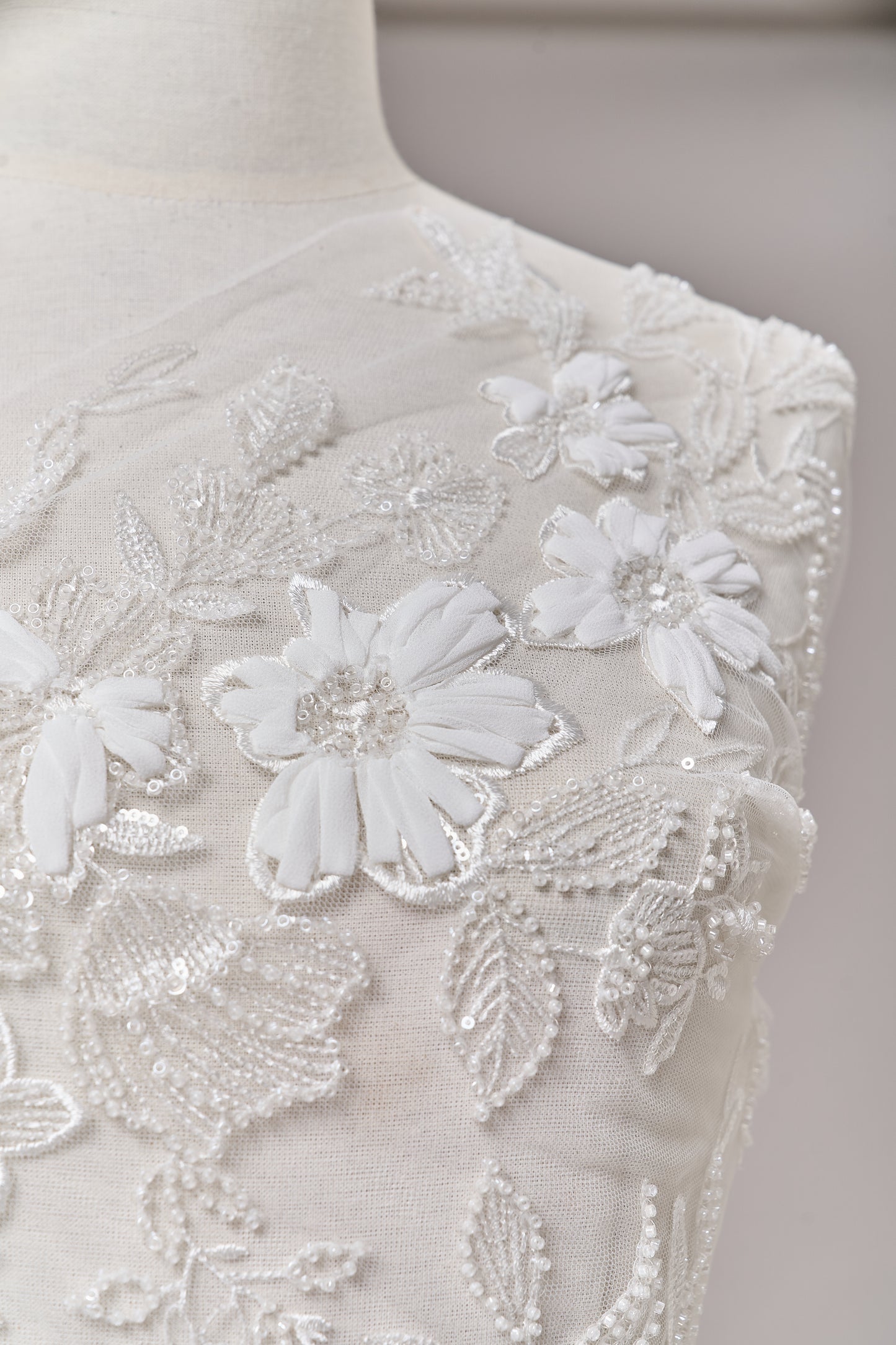 S0689 - Embroidered tulle with 3D chiffon flowers, off-white beads, and transparent sequins