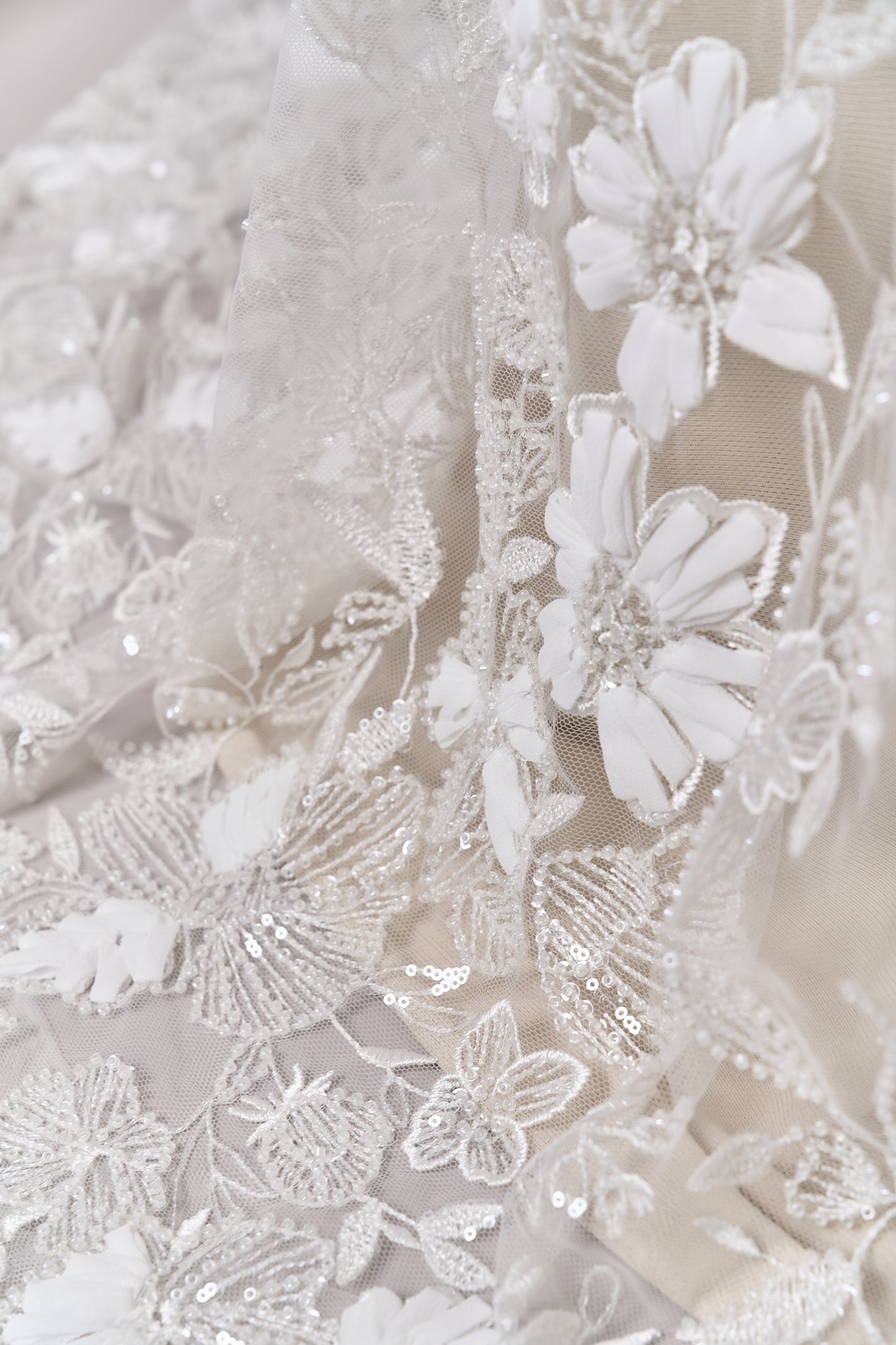 S0689 - Embroidered tulle with 3D chiffon flowers, off-white beads, and transparent sequins