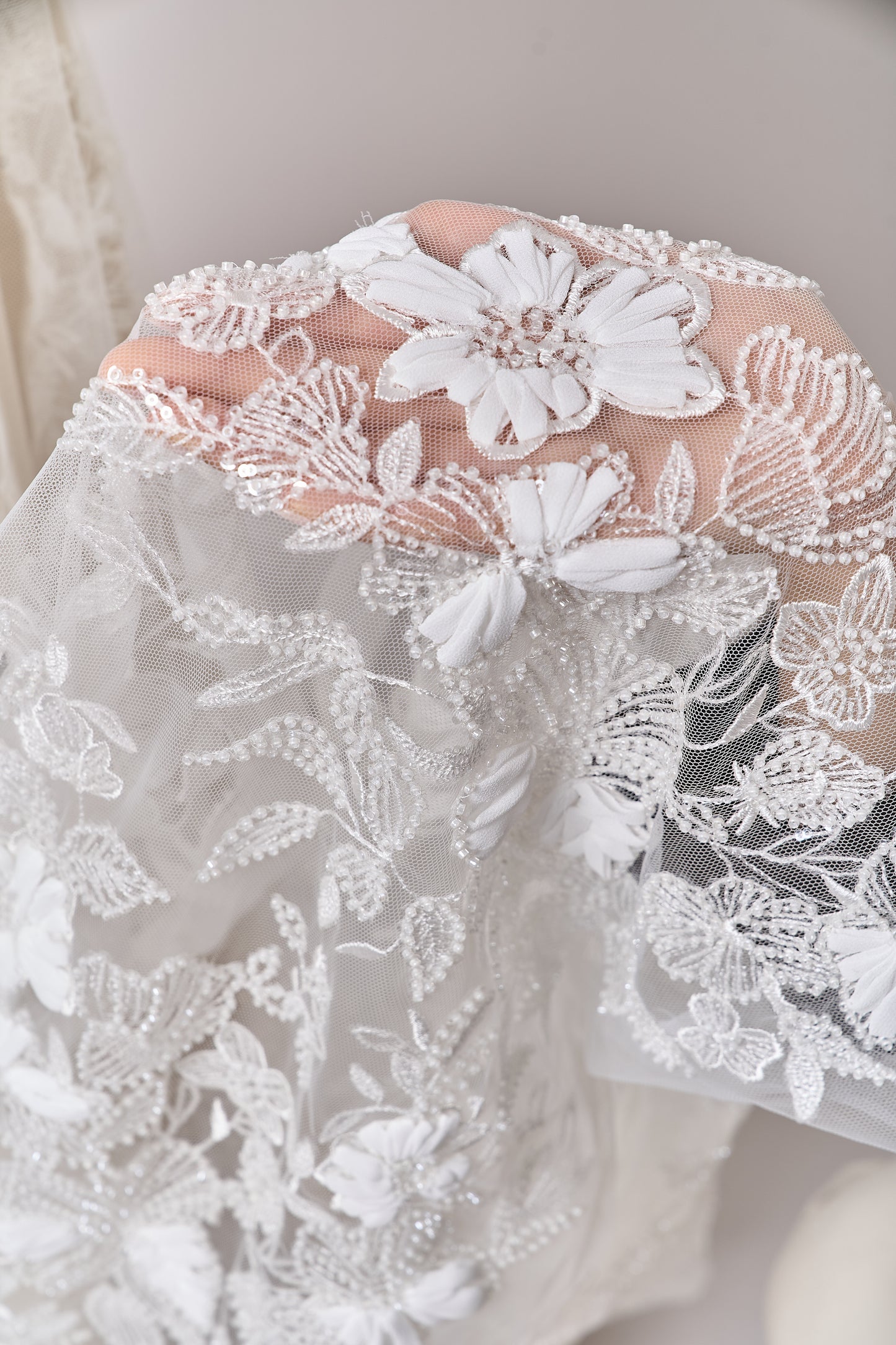 S0689 - Embroidered tulle with 3D chiffon flowers, off-white beads, and transparent sequins