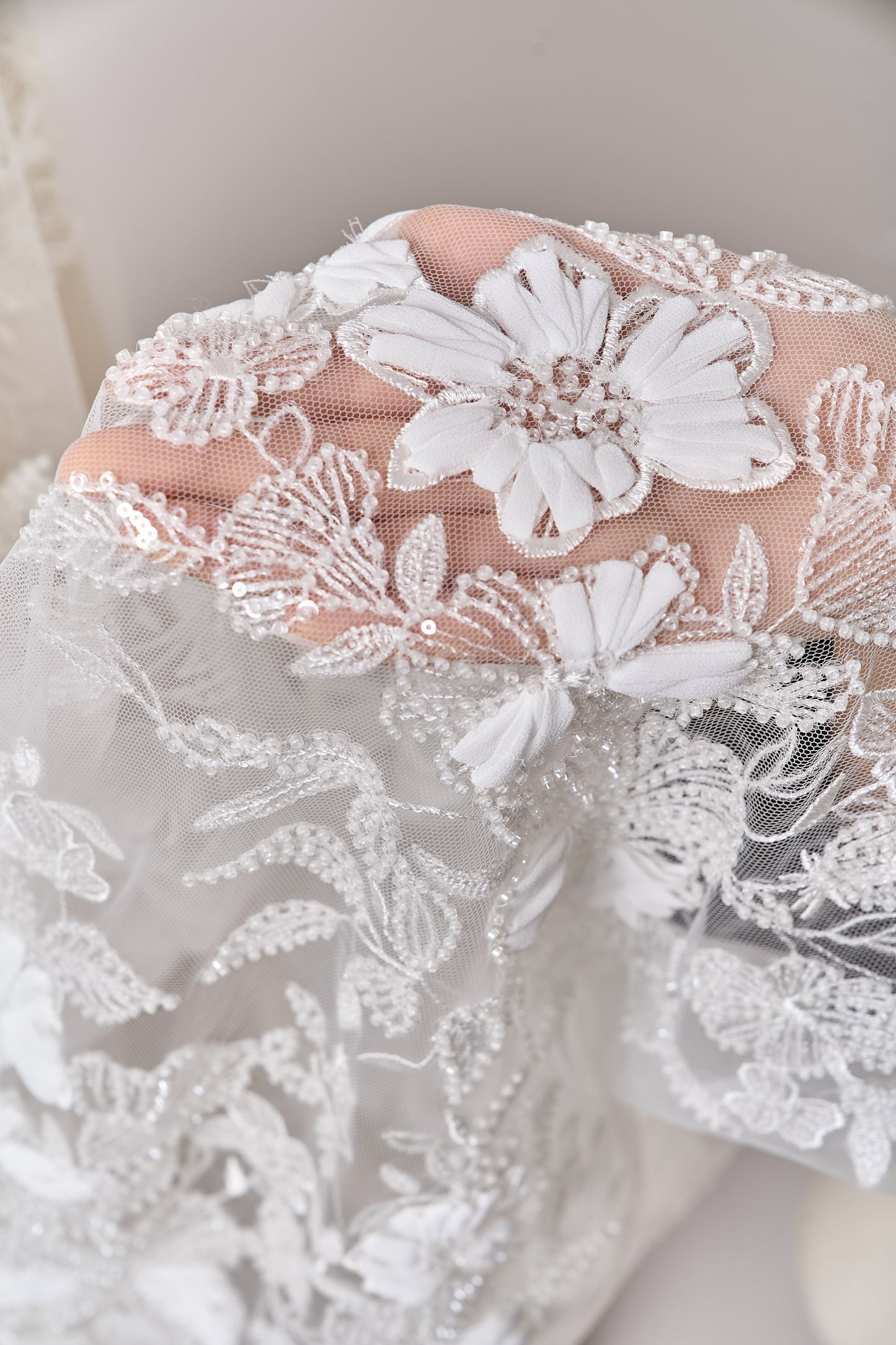S0689 - Embroidered tulle with 3D chiffon flowers, off-white beads, and transparent sequins