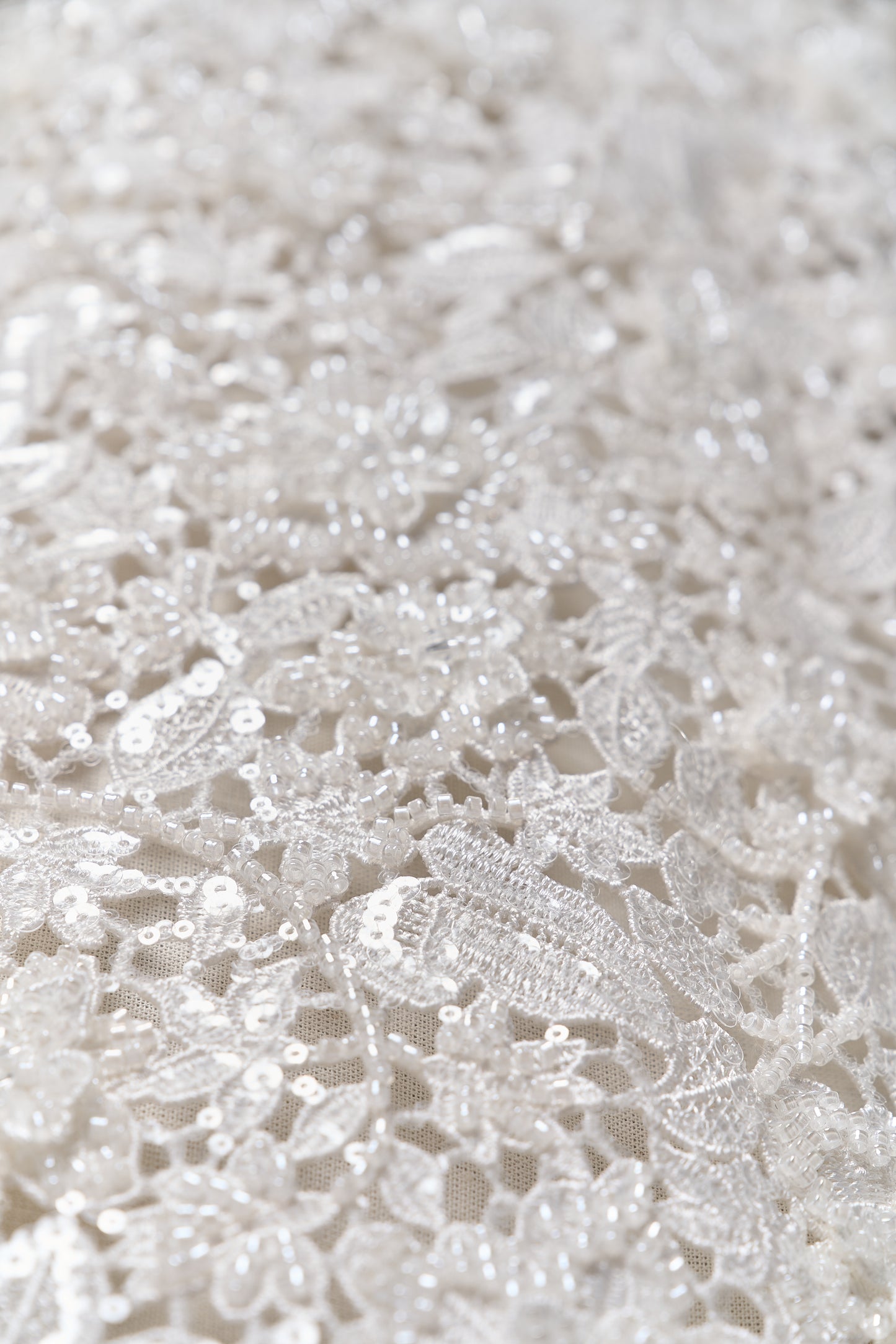 S0685 - Guipure embroidered with 3D flowers, off-white beads, transparent rhinestones, and transparent sequins