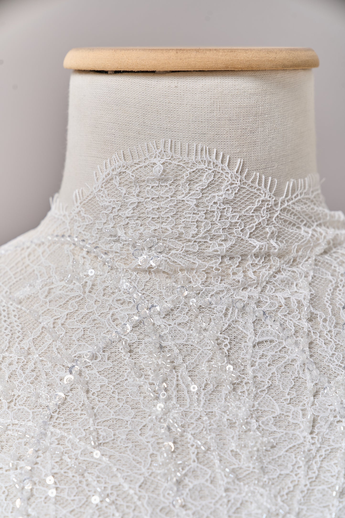 S0677 - Embroidered lace with off-white beads, transparent and silver sequins