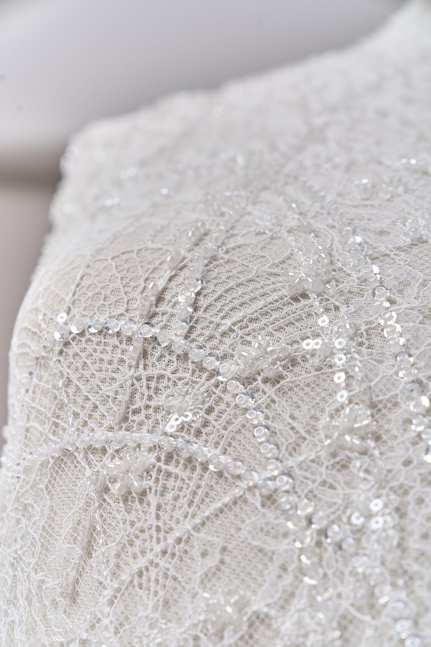 S0677 - Embroidered lace with off-white beads, transparent and silver sequins