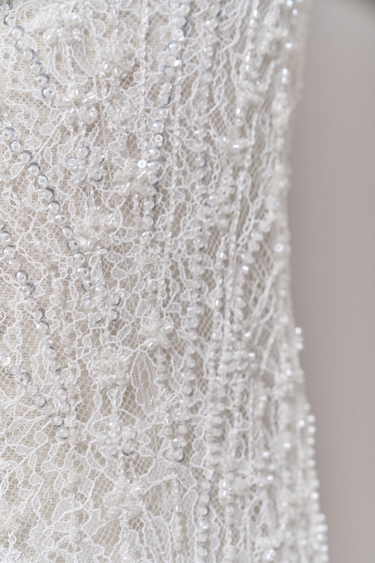 S0677 - Embroidered lace with off-white beads, transparent and silver sequins