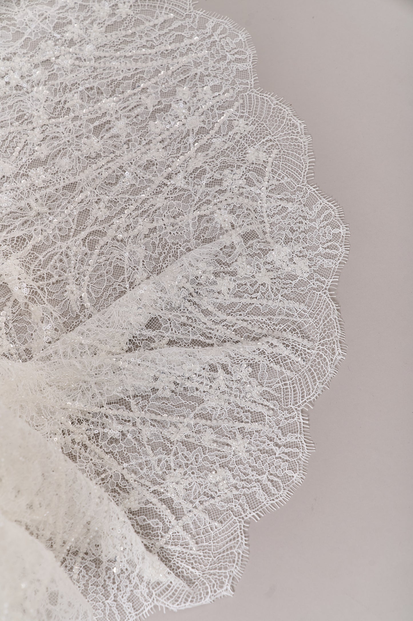 S0677 - Embroidered lace with off-white beads, transparent and silver sequins