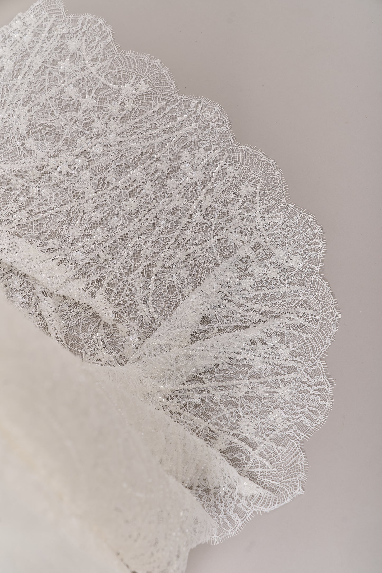 S0677 - Embroidered lace with off-white beads, transparent and silver sequins