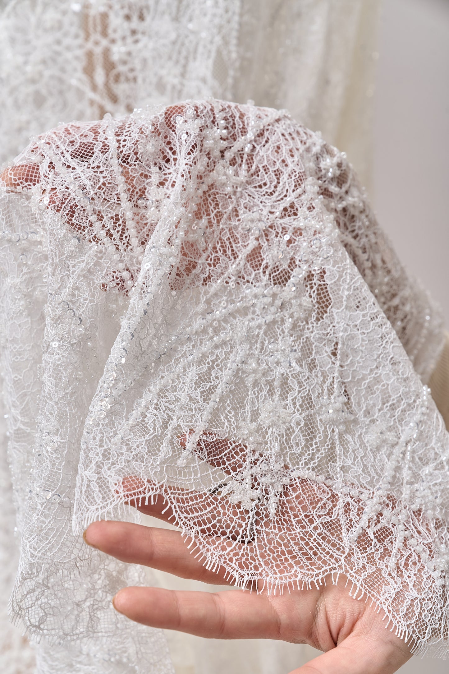 S0677 - Embroidered lace with off-white beads, transparent and silver sequins