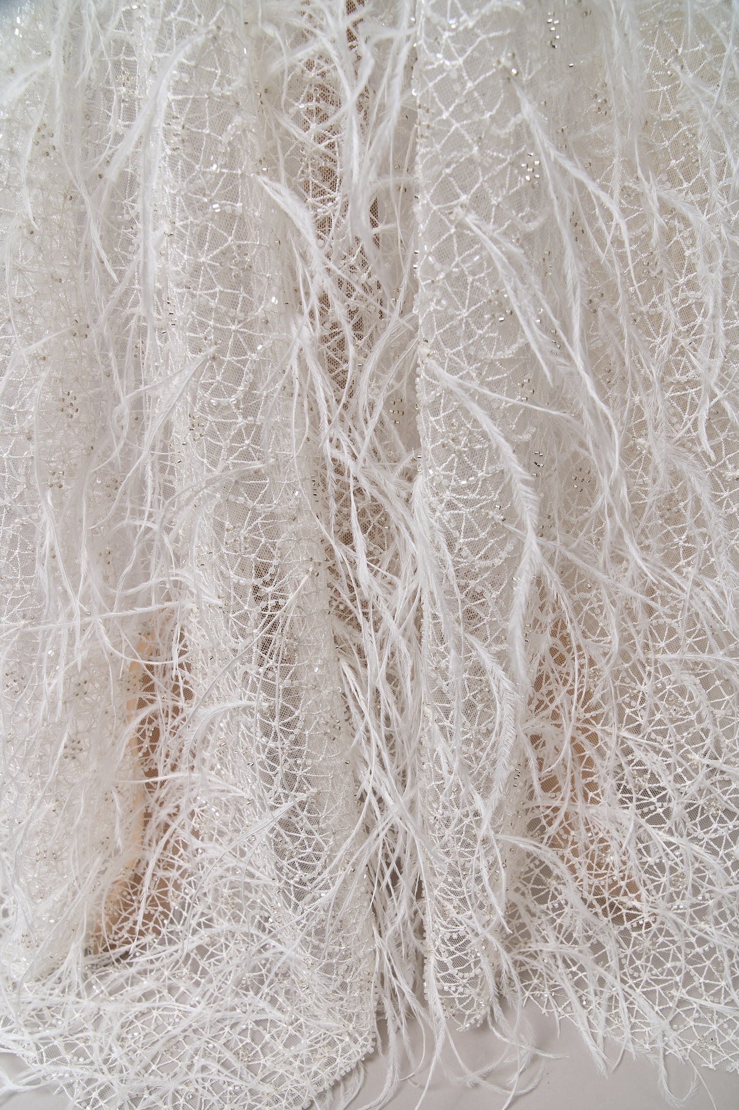 S0680 - Embroidered tulle with off-white and silver beads, transparent sequins, and real feathers