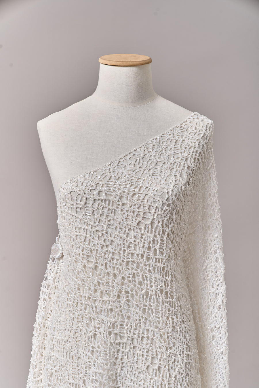 S0687 - Embroidered netting with matte off-white sequins and off-white beads