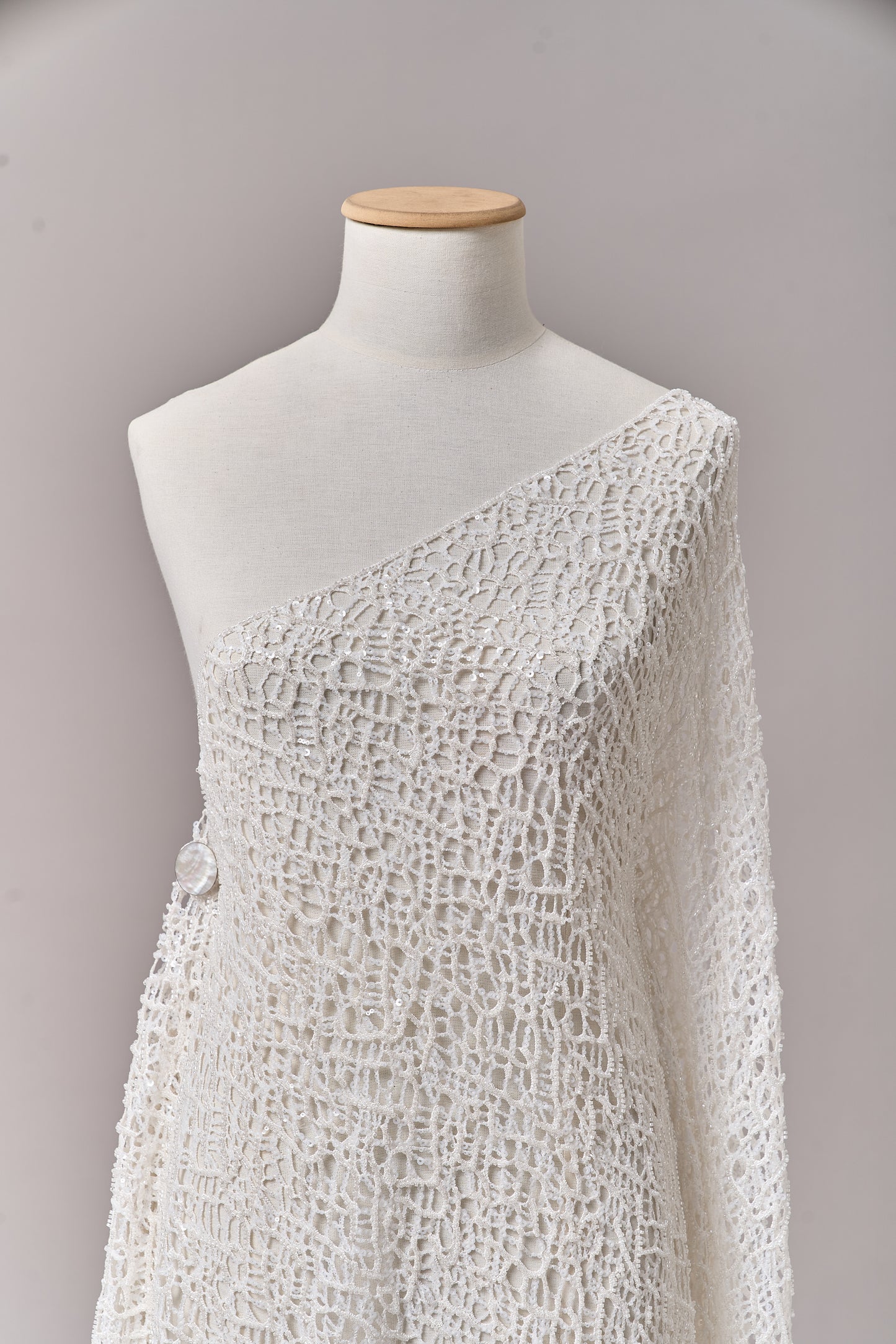 S0687 - Embroidered netting with matte off-white sequins and off-white beads