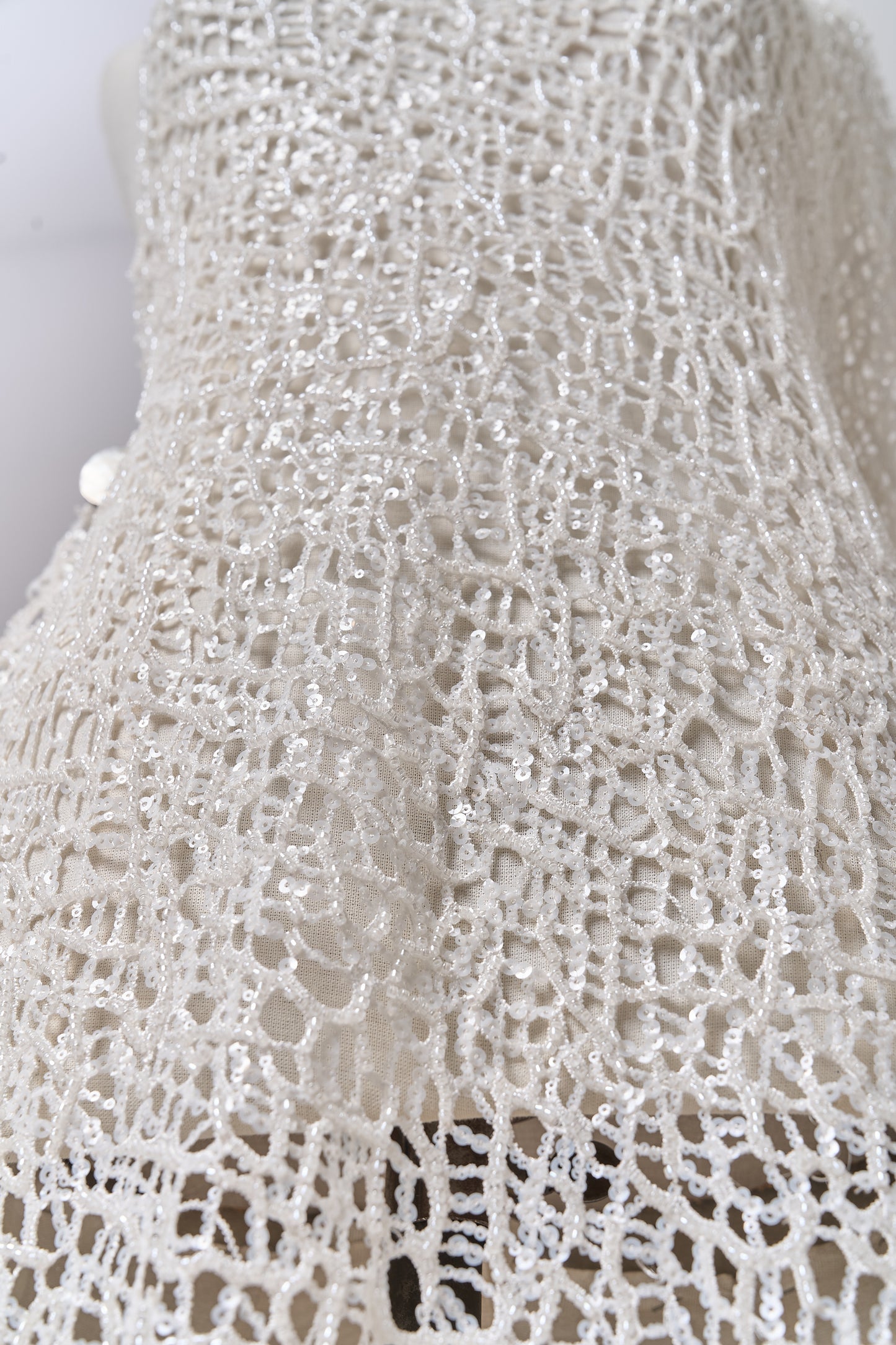 S0687 - Embroidered netting with matte off-white sequins and off-white beads