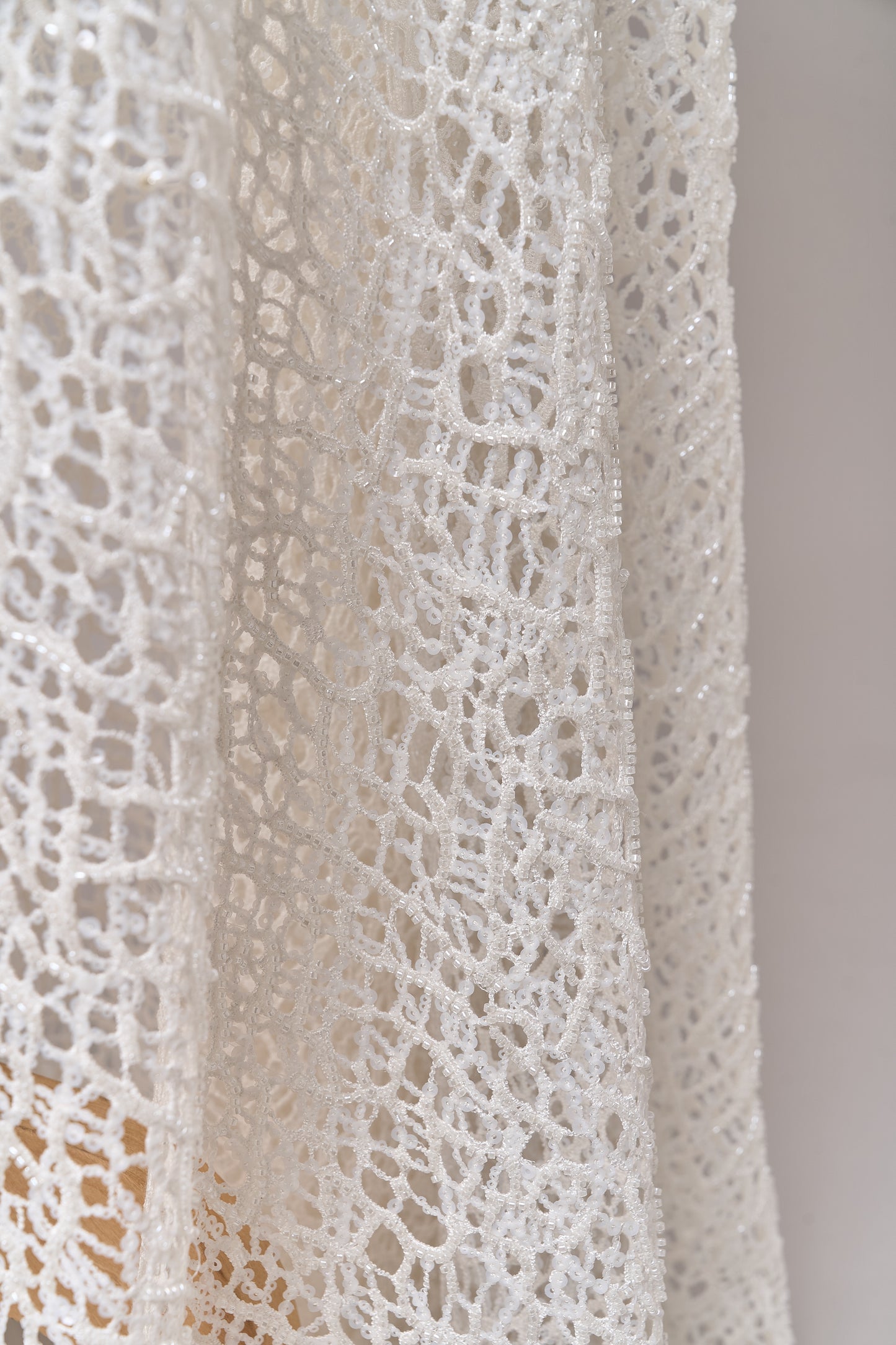 S0687 - Embroidered netting with matte off-white sequins and off-white beads