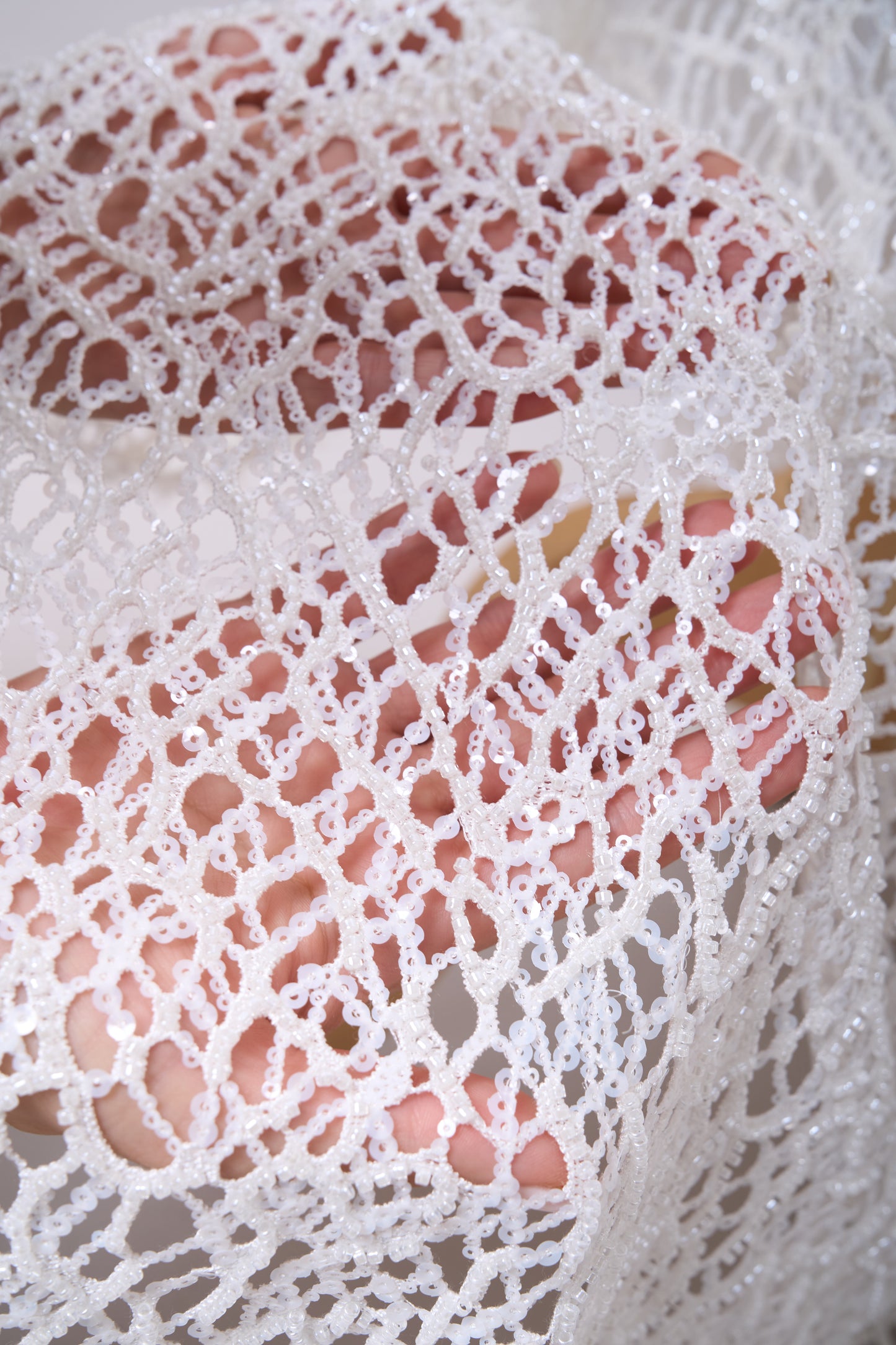 S0687 - Embroidered netting with matte off-white sequins and off-white beads