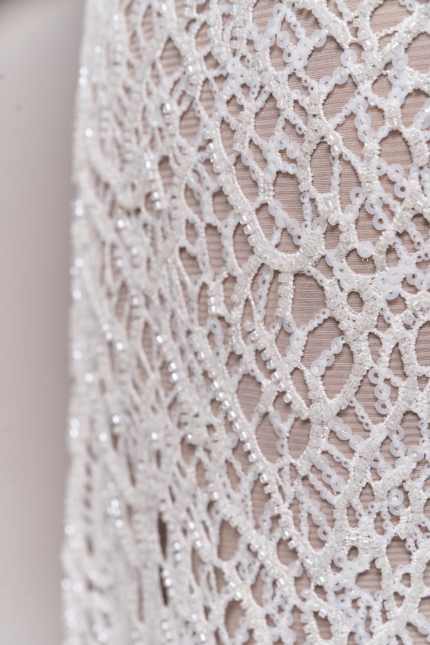 S0687 - Embroidered netting with matte off-white sequins and off-white beads