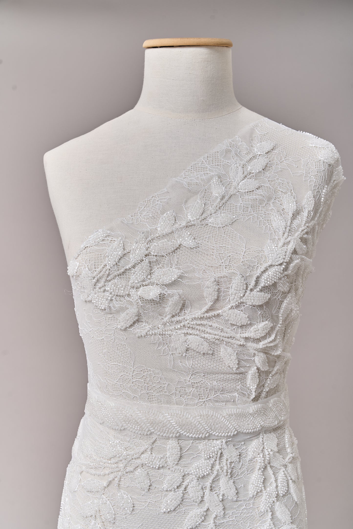 S0702 - Embroidered lace with off-white beads