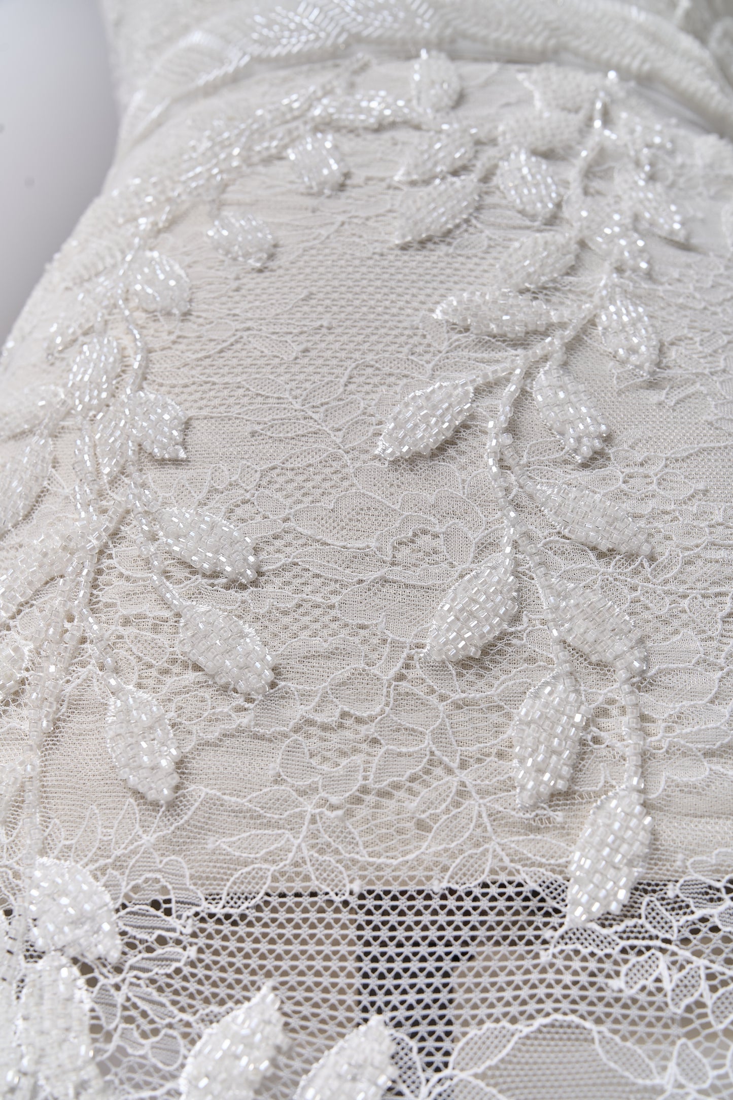 S0702 - Embroidered lace with off-white beads