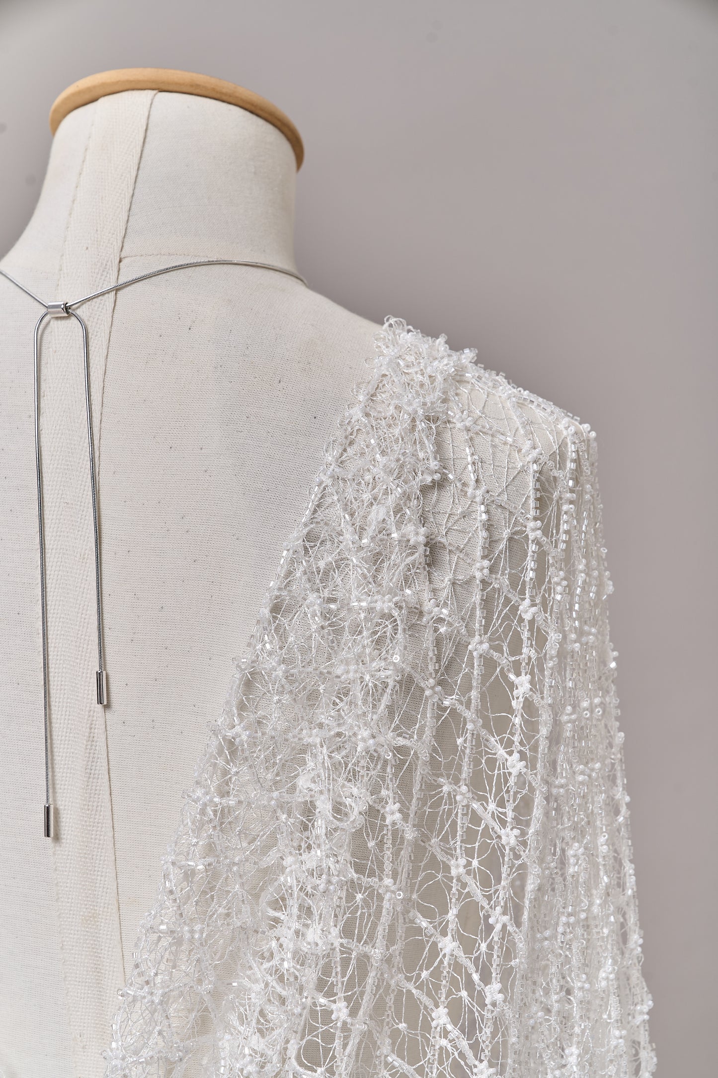 S0682 - Netting with off-white beads and transparent bugle beads