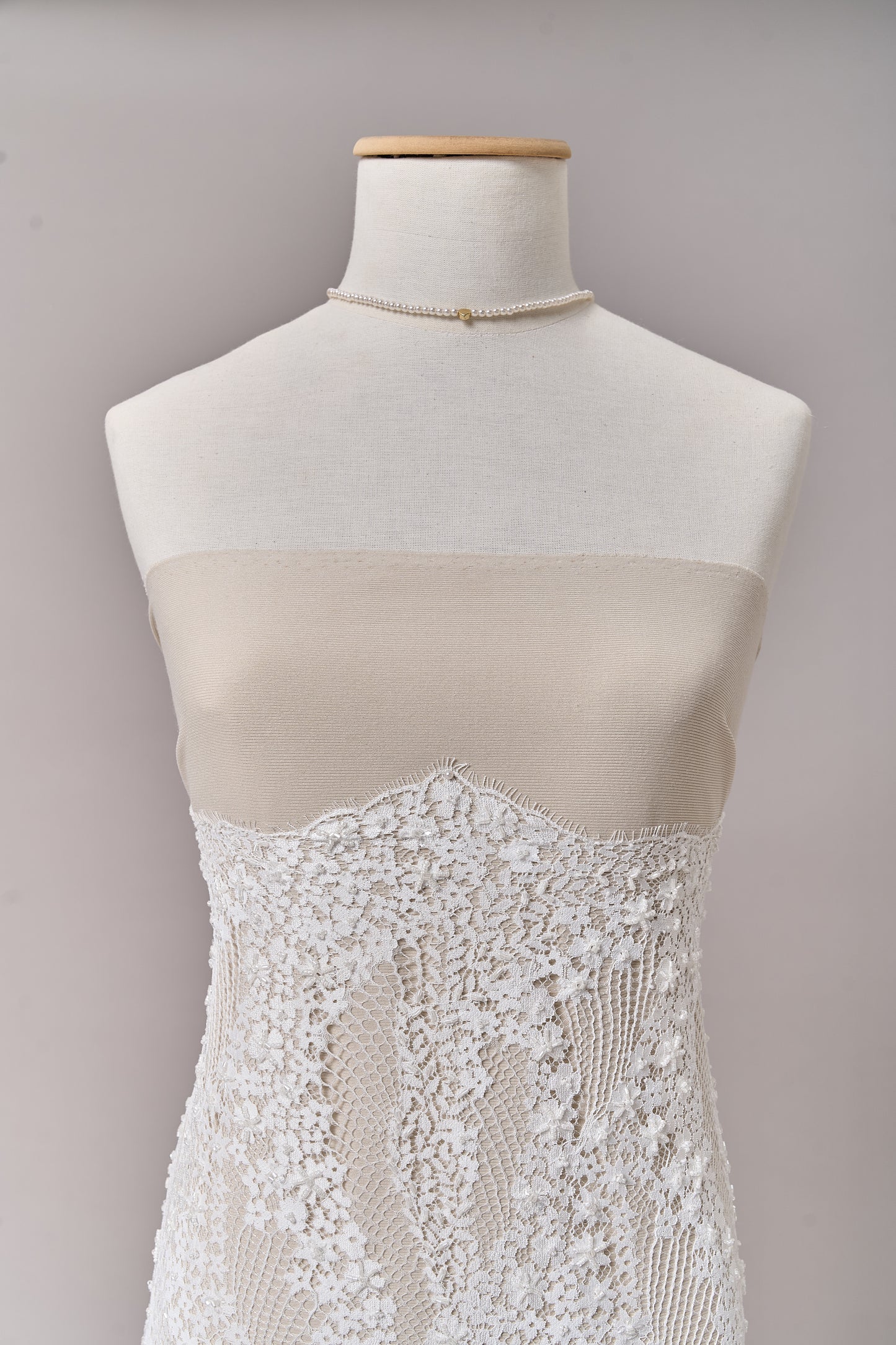 S0679 - Embroidered lace with off-white &nbsp;beads, long off-white bugle beads, and transparent sequins