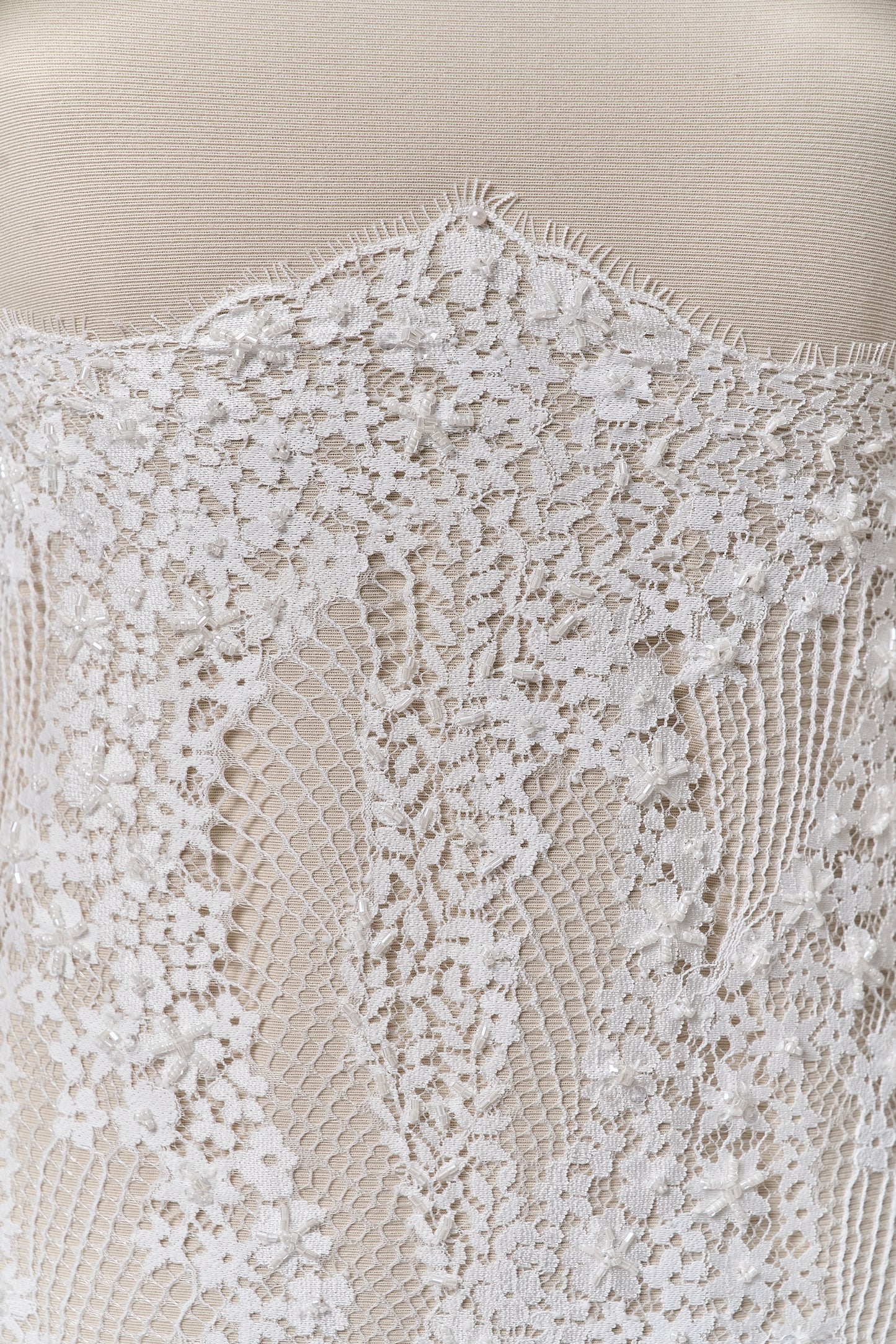 S0679 - Embroidered lace with off-white &nbsp;beads, long off-white bugle beads, and transparent sequins