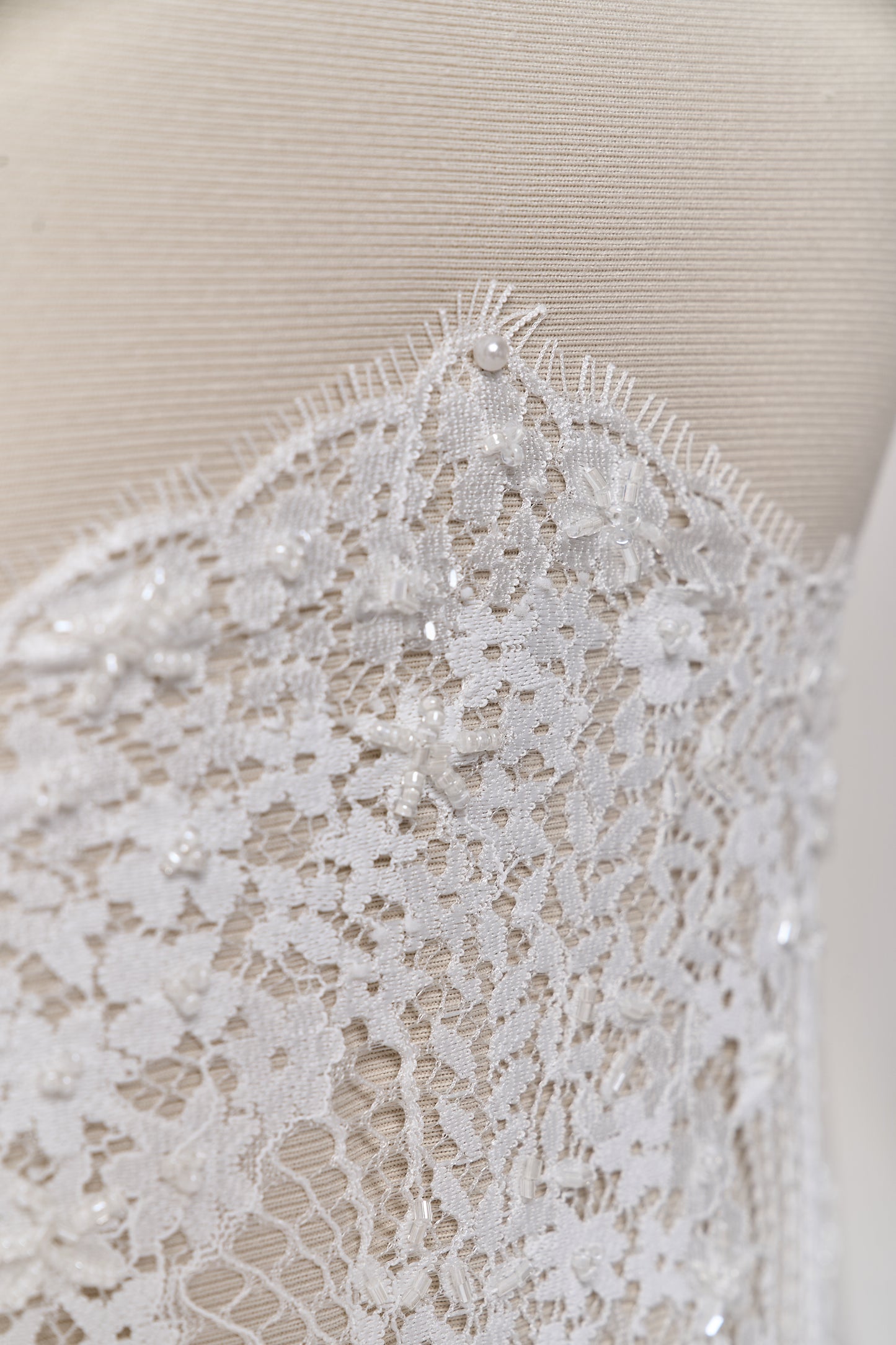S0679 - Embroidered lace with off-white &nbsp;beads, long off-white bugle beads, and transparent sequins