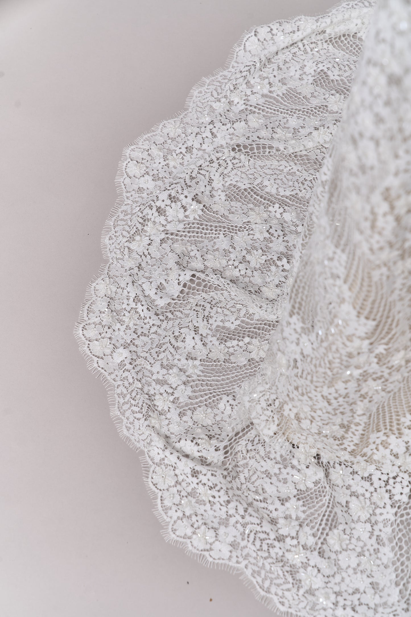 S0679 - Embroidered lace with off-white &nbsp;beads, long off-white bugle beads, and transparent sequins