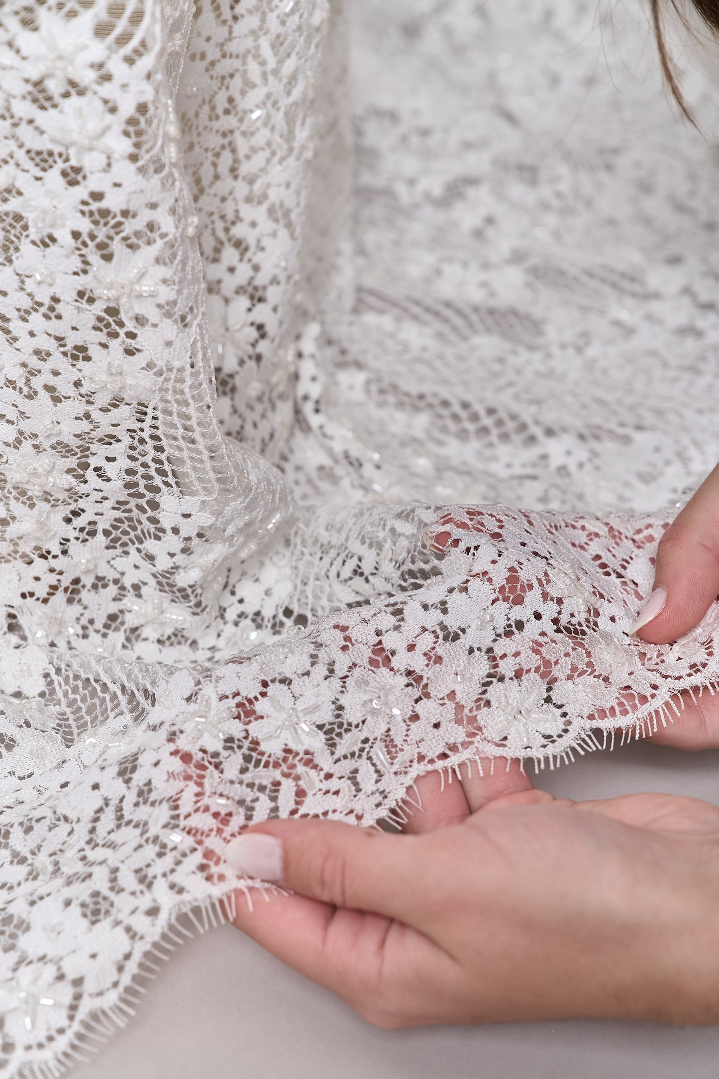 S0679 - Embroidered lace with off-white &nbsp;beads, long off-white bugle beads, and transparent sequins