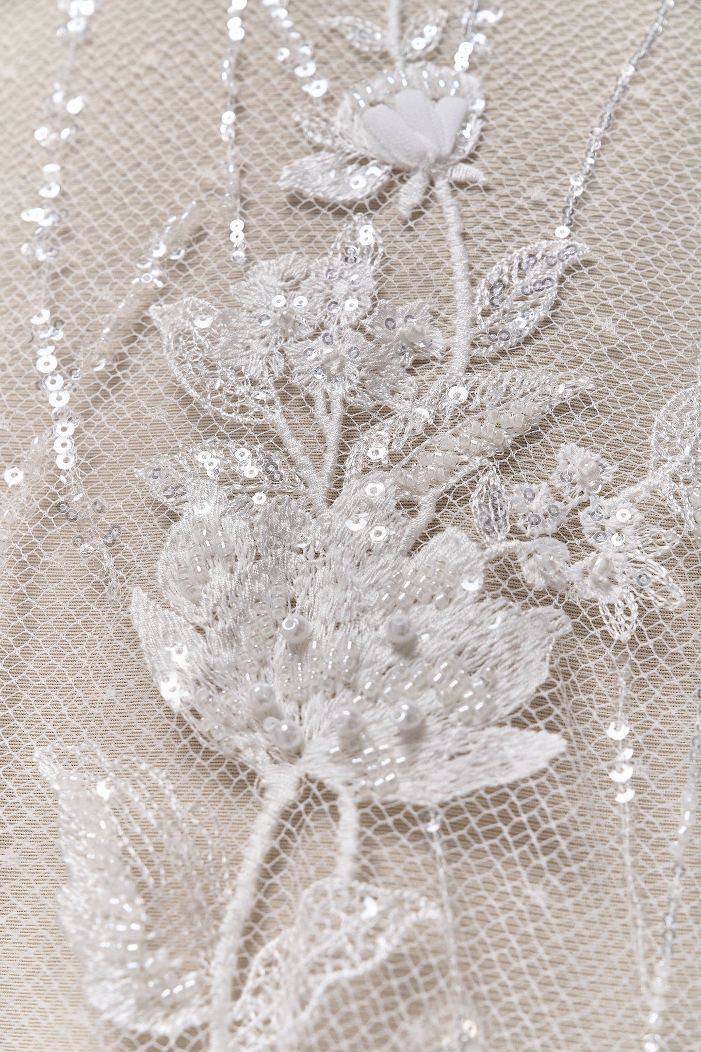 684 - Embroidered netting with 3D chiffon flowers, off-white beads, transparent and silver sequins