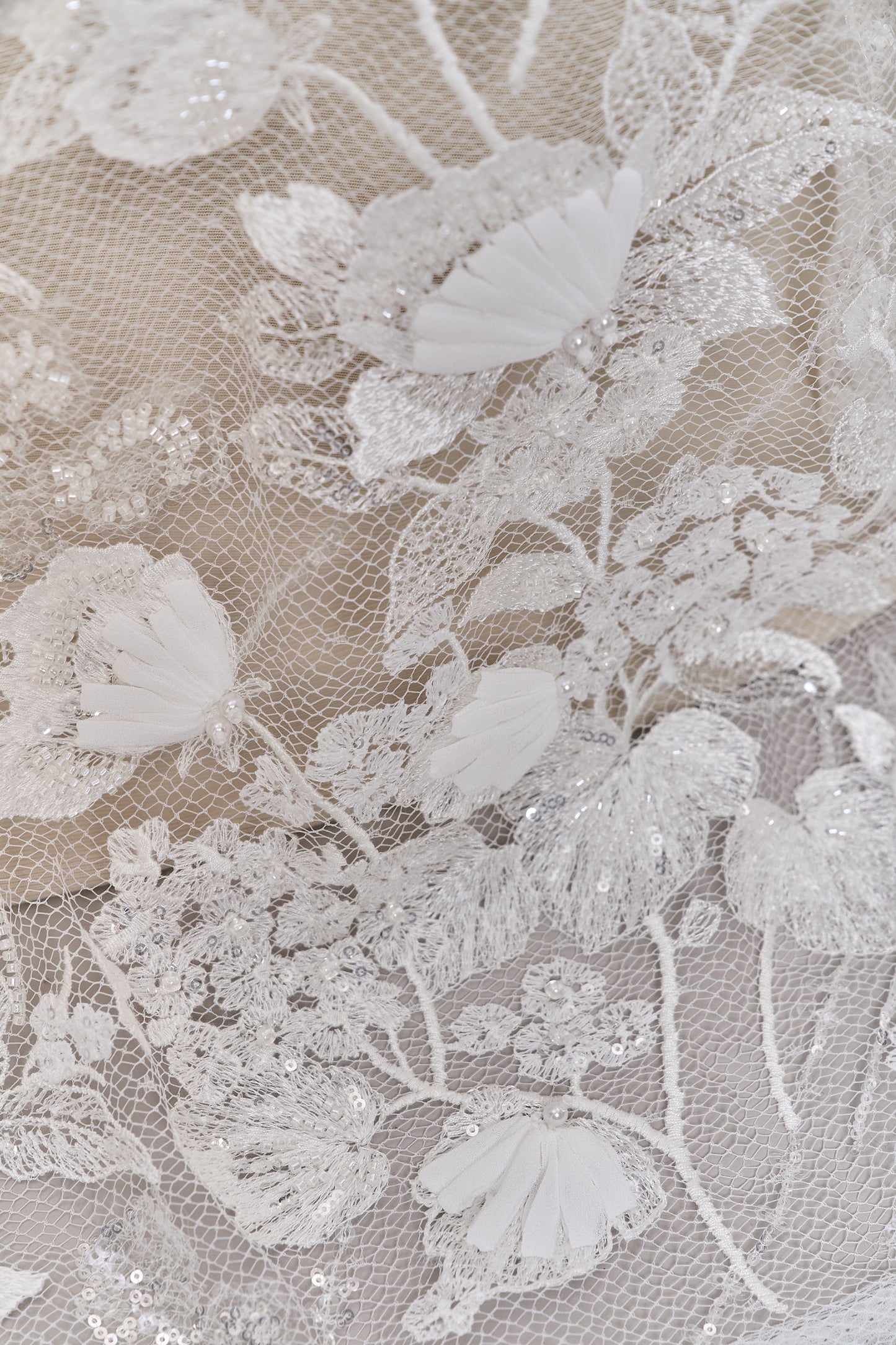 684 - Embroidered netting with 3D chiffon flowers, off-white beads, transparent and silver sequins