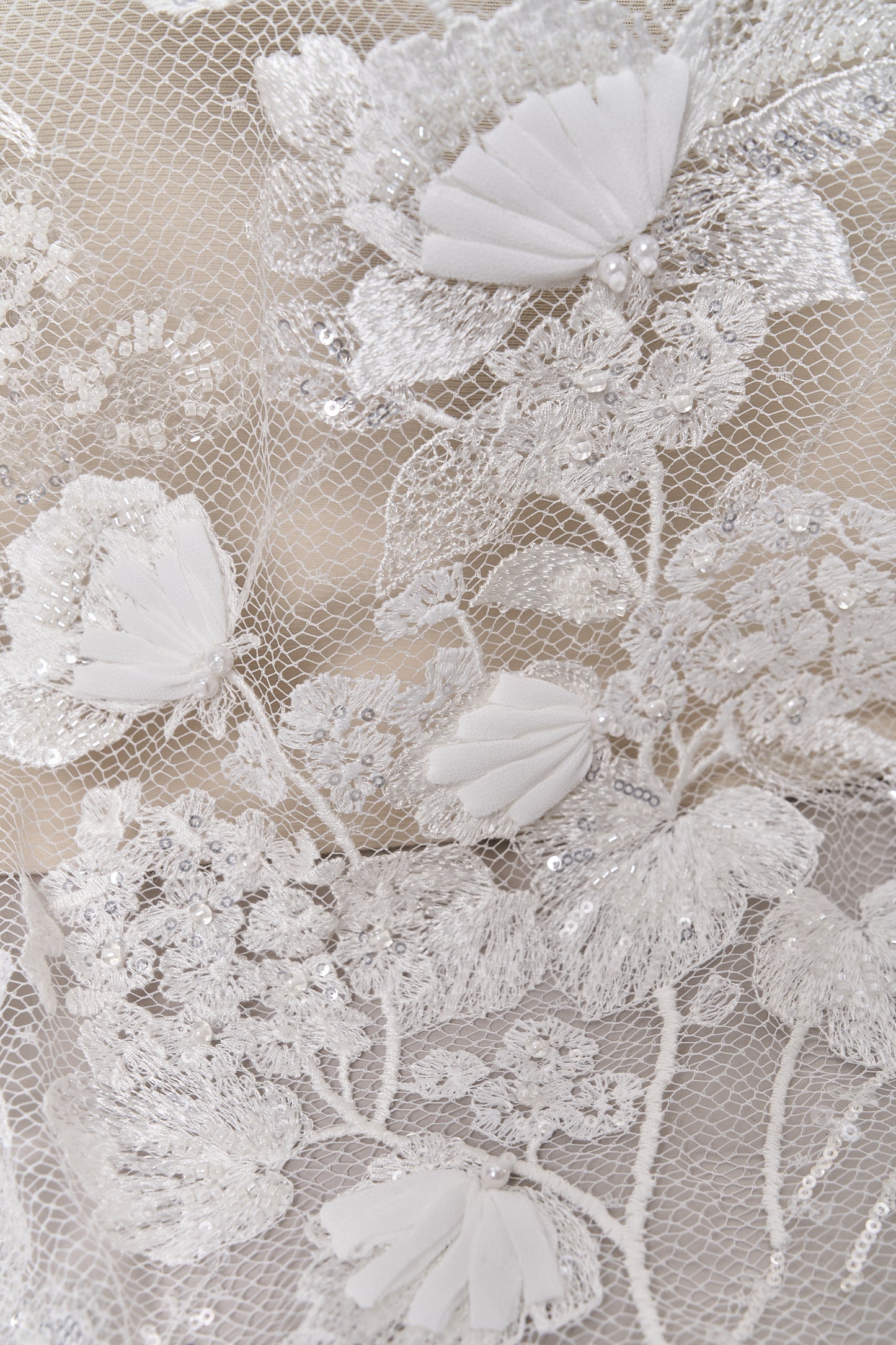 684 - Embroidered netting with 3D chiffon flowers, off-white beads, transparent and silver sequins