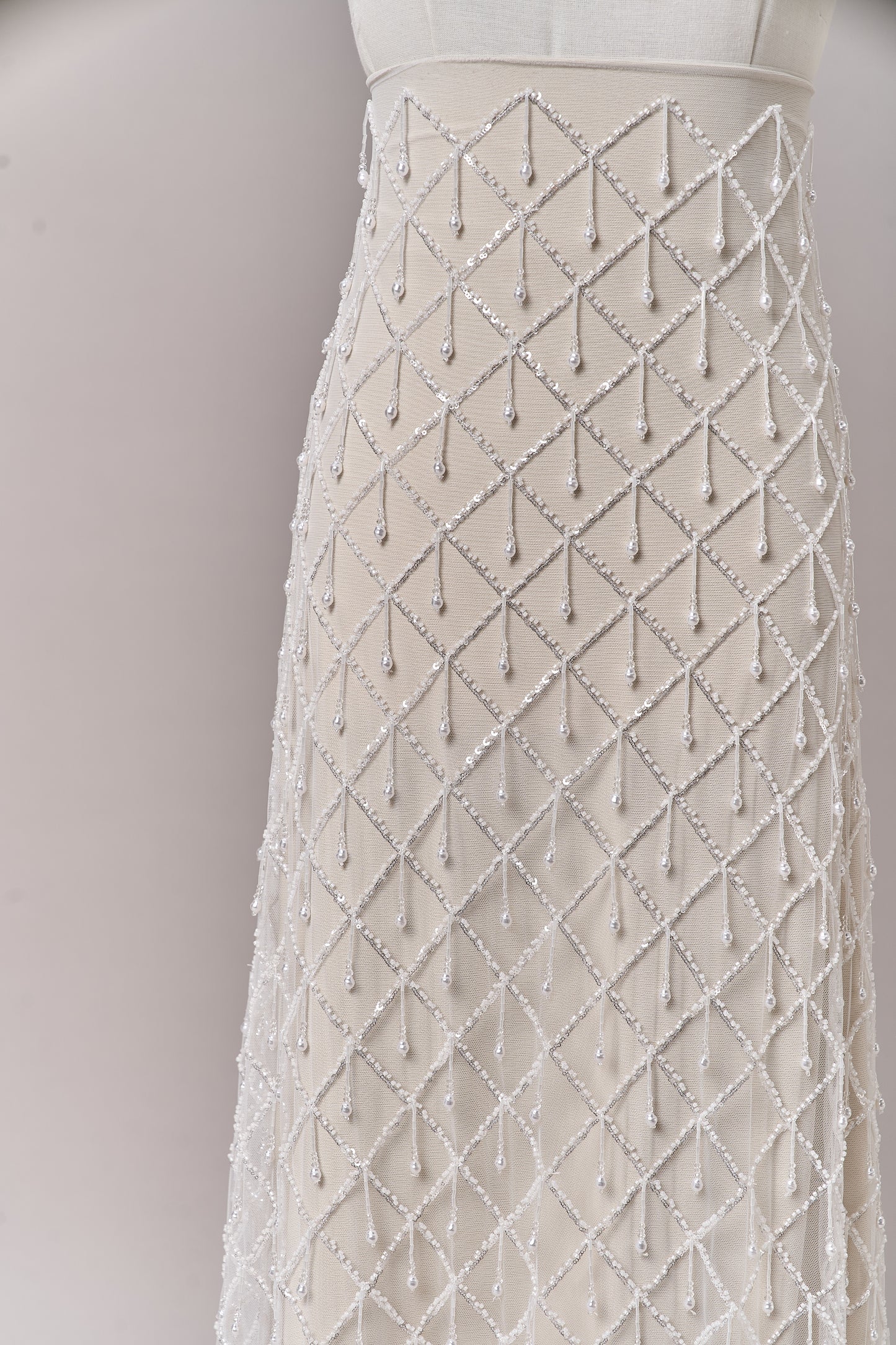 S0709 - Embroidered tulle with off-white beads, silver sequins, long off-white bugle bead fringe, transparent rhinestones, and nacre pearls